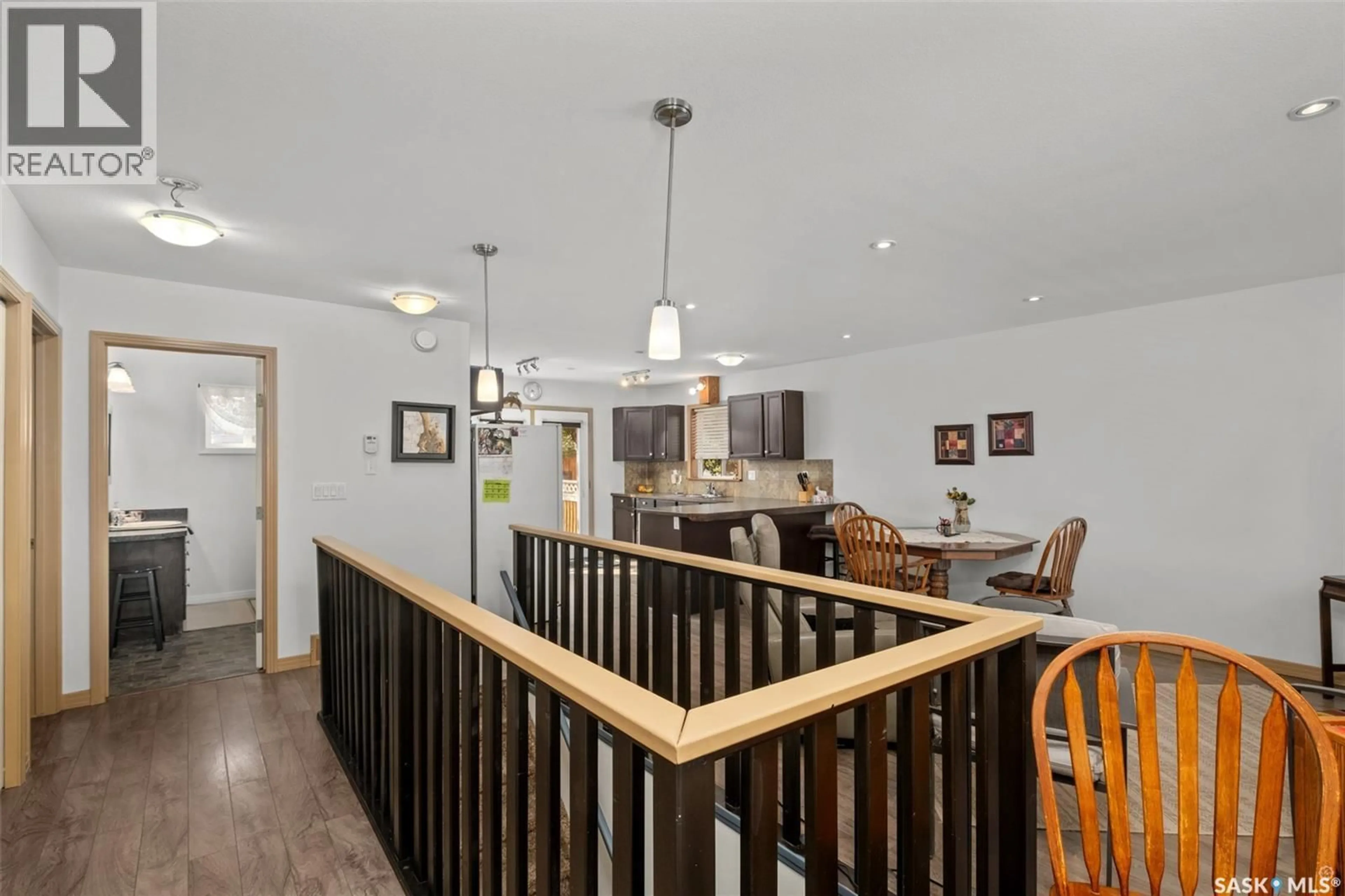 Open concept kitchen, wood/laminate floor for 441 6TH STREET, Prince Albert Saskatchewan S6V0N3