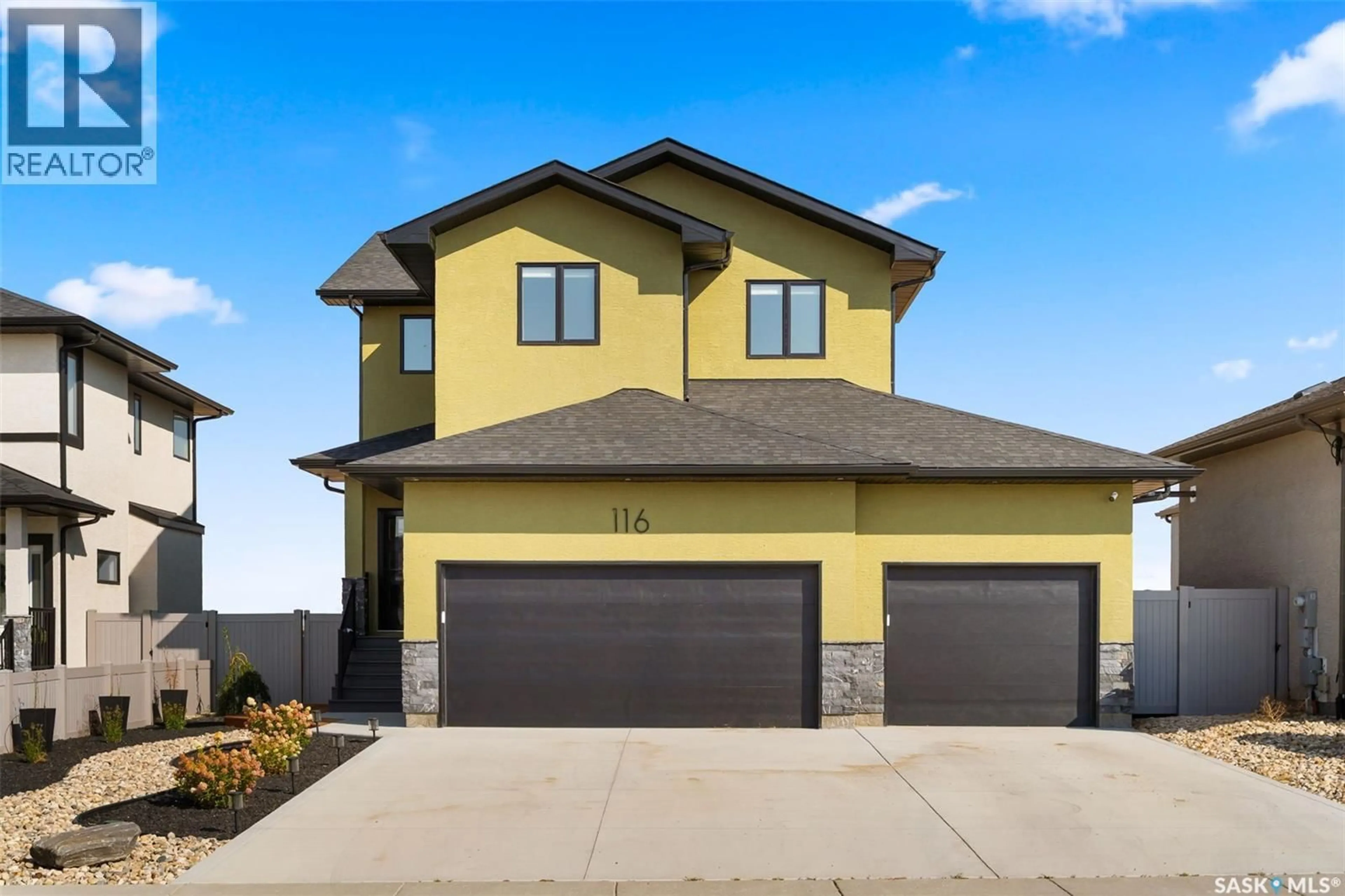 Home with vinyl exterior material, street for 116 VESTOR DRIVE, Pilot Butte Saskatchewan S0G3Z0