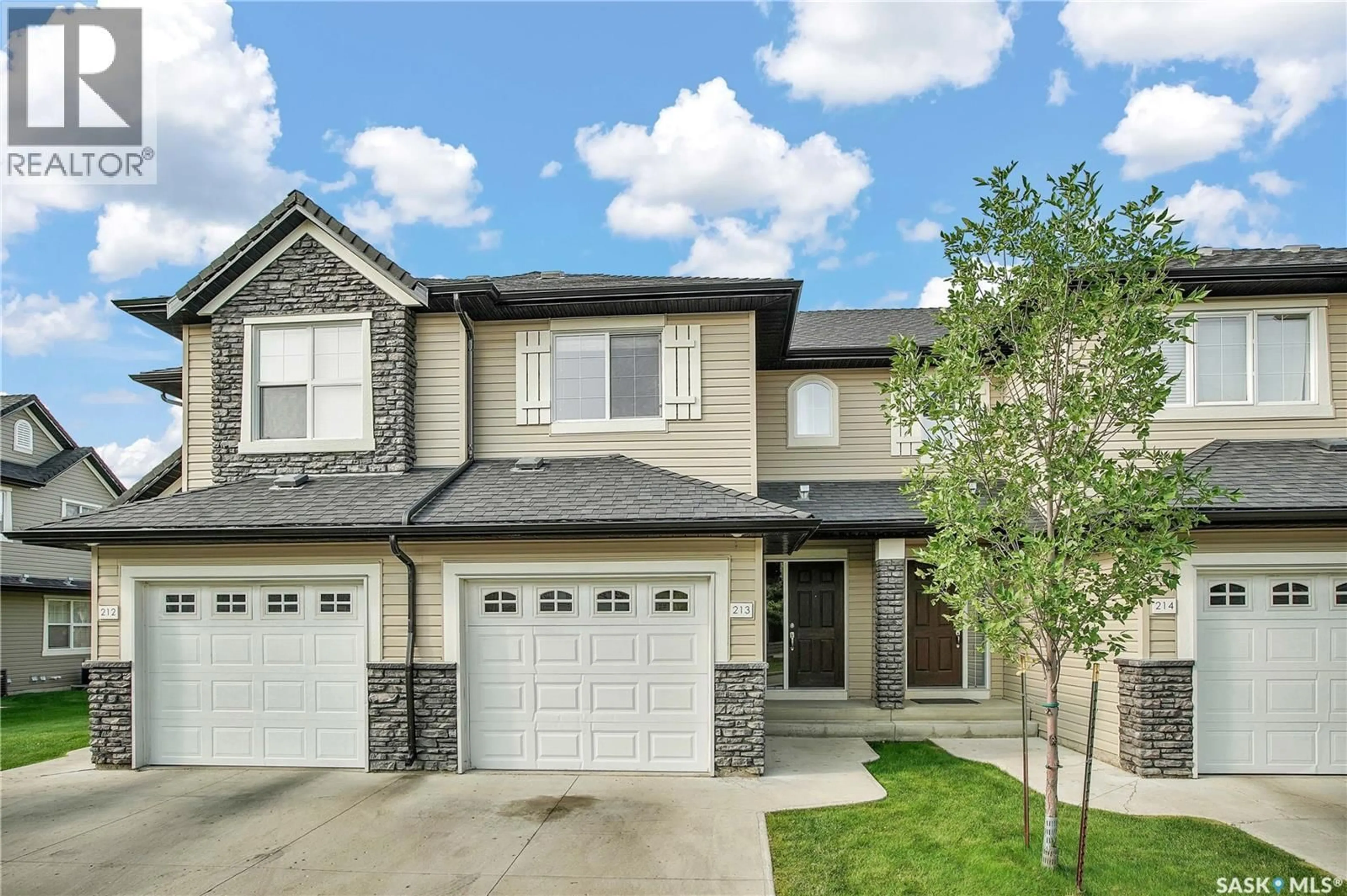 Home with vinyl exterior material, street for 410 - 213 LEDINGHAM WAY, Saskatoon Saskatchewan S7V0C4