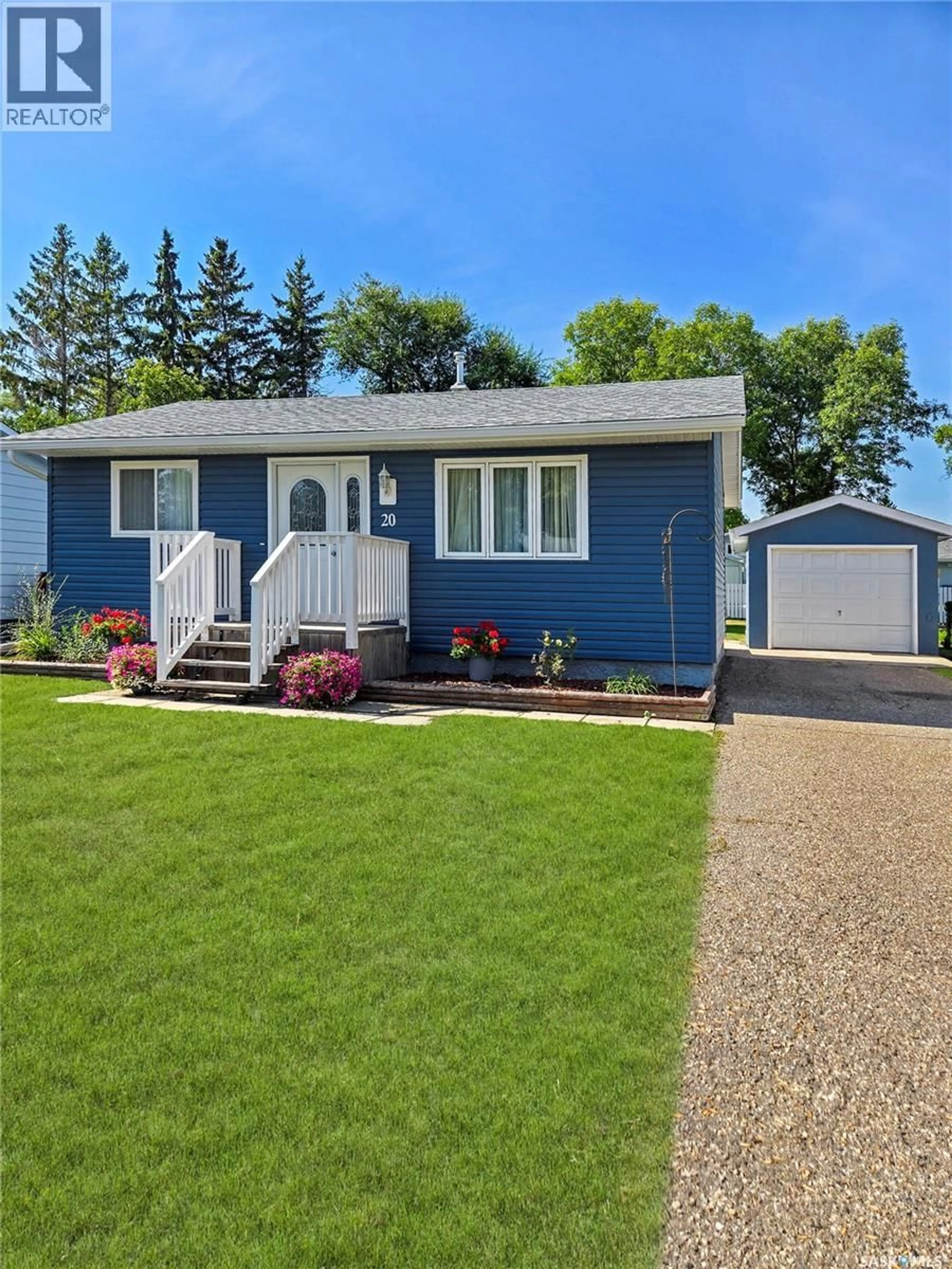 Home with vinyl exterior material, street for 20 REDWOOD DRIVE, Yorkton Saskatchewan S3N2X7
