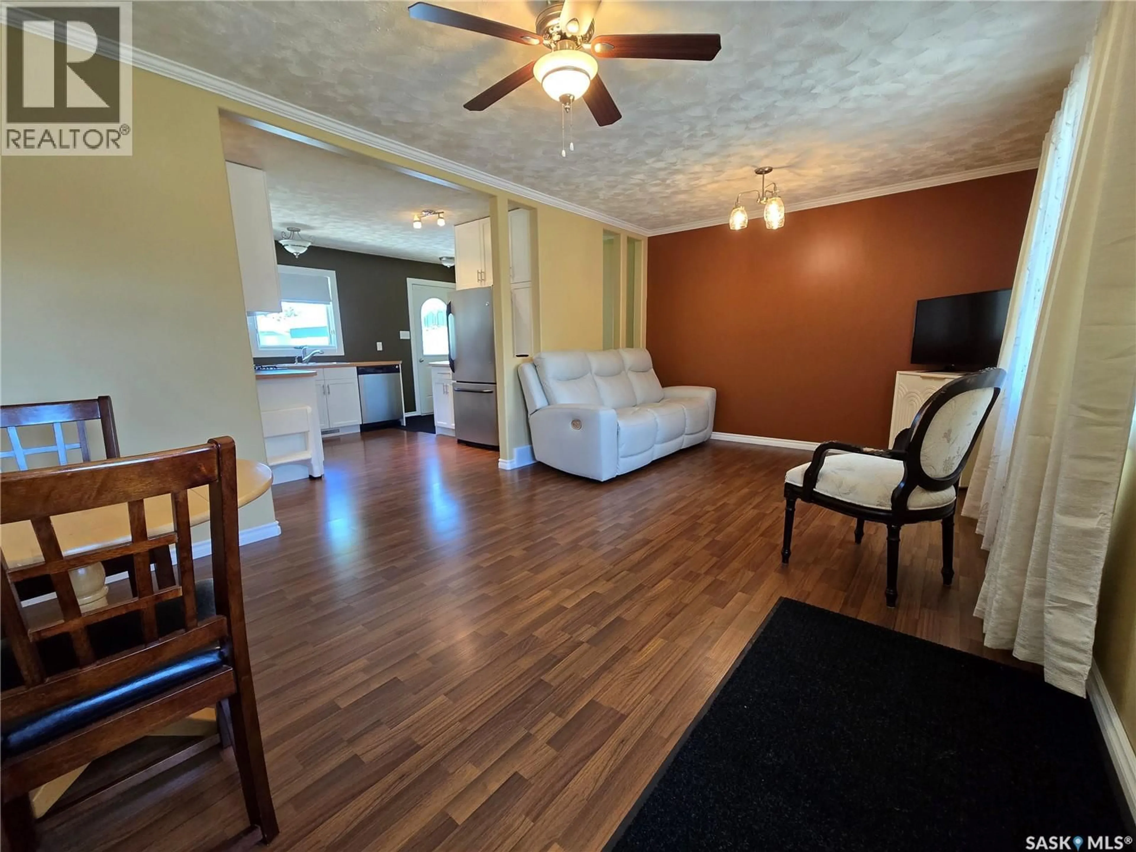 Living room with furniture, wood/laminate floor for 20 REDWOOD DRIVE, Yorkton Saskatchewan S3N2X7