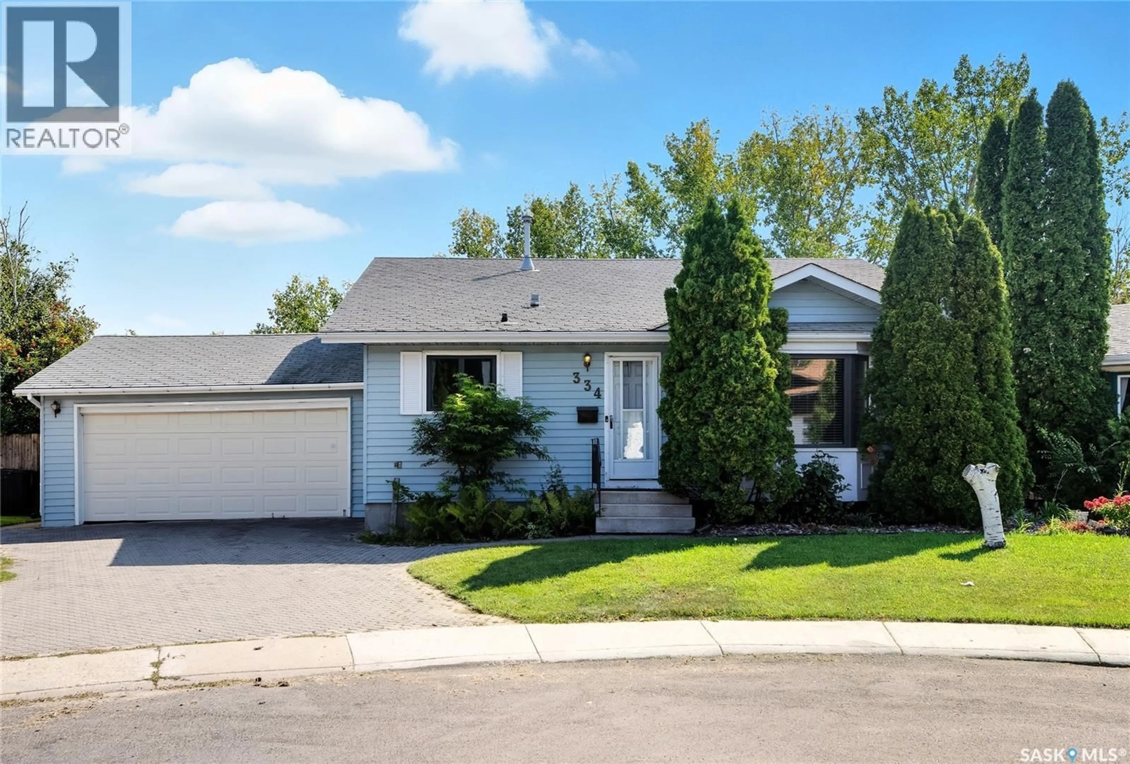 Home with vinyl exterior material, street for 334 WOLLASTON RISE, Saskatoon Saskatchewan S7J4M5