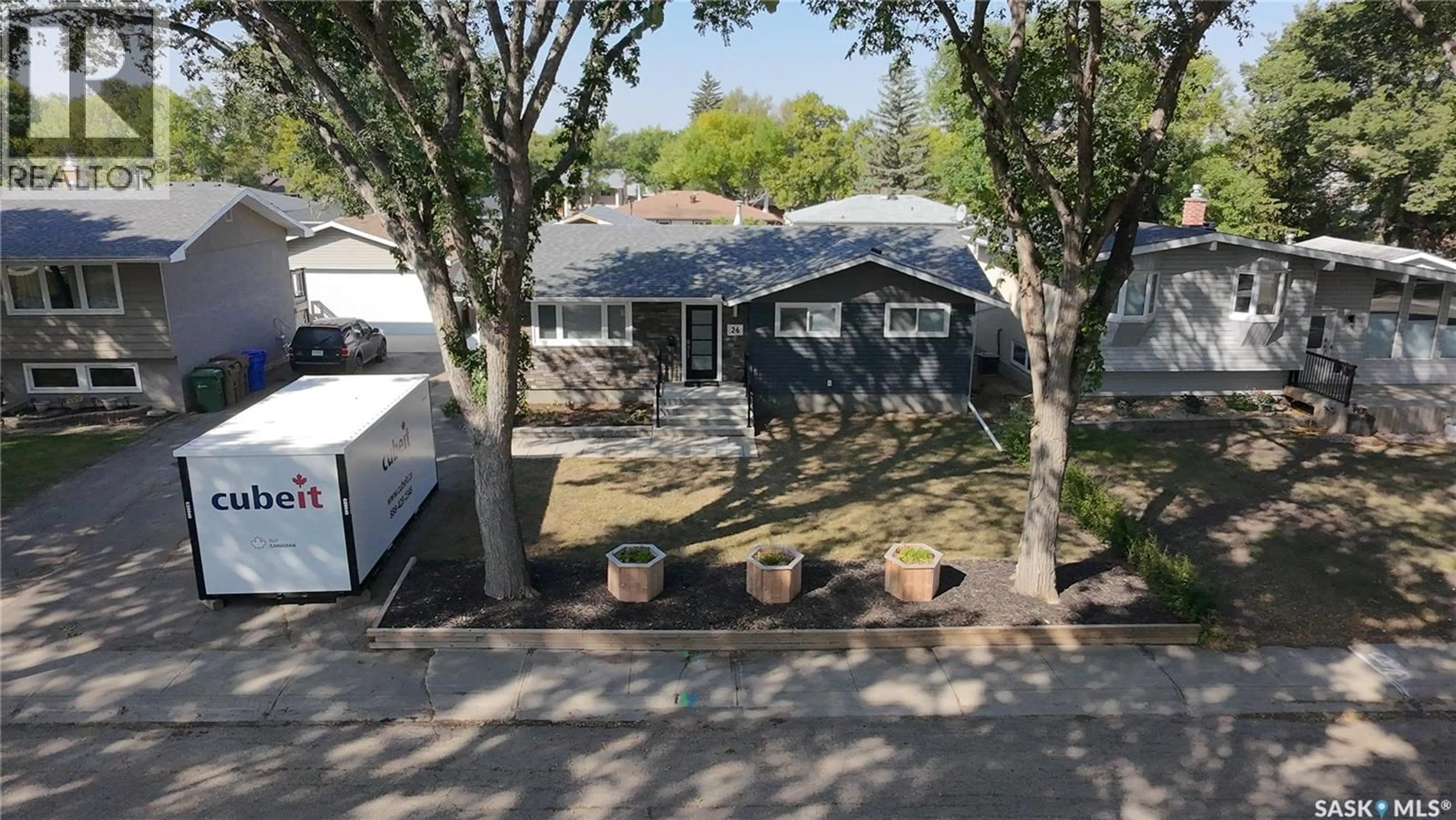 A pic from outside/outdoor area/front of a property/back of a property/a pic from drone, street for 26 NORWOOD CRESCENT, Regina Saskatchewan S4R0A1