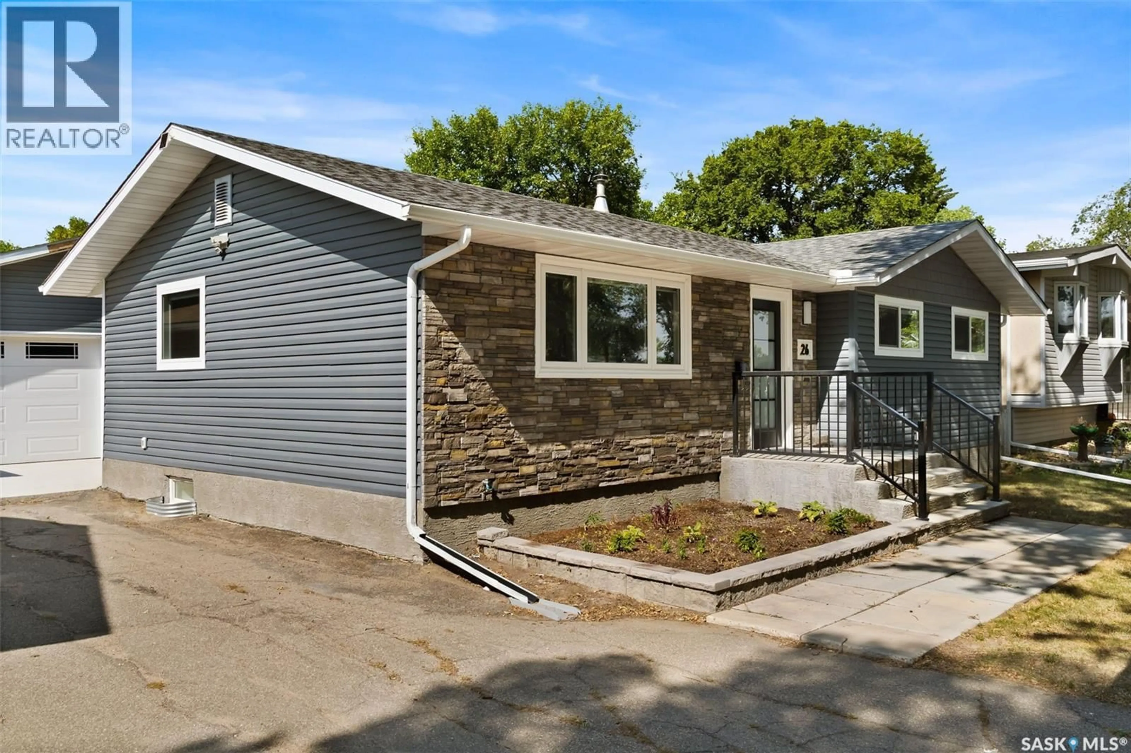 Home with vinyl exterior material, street for 26 NORWOOD CRESCENT, Regina Saskatchewan S4R0A1