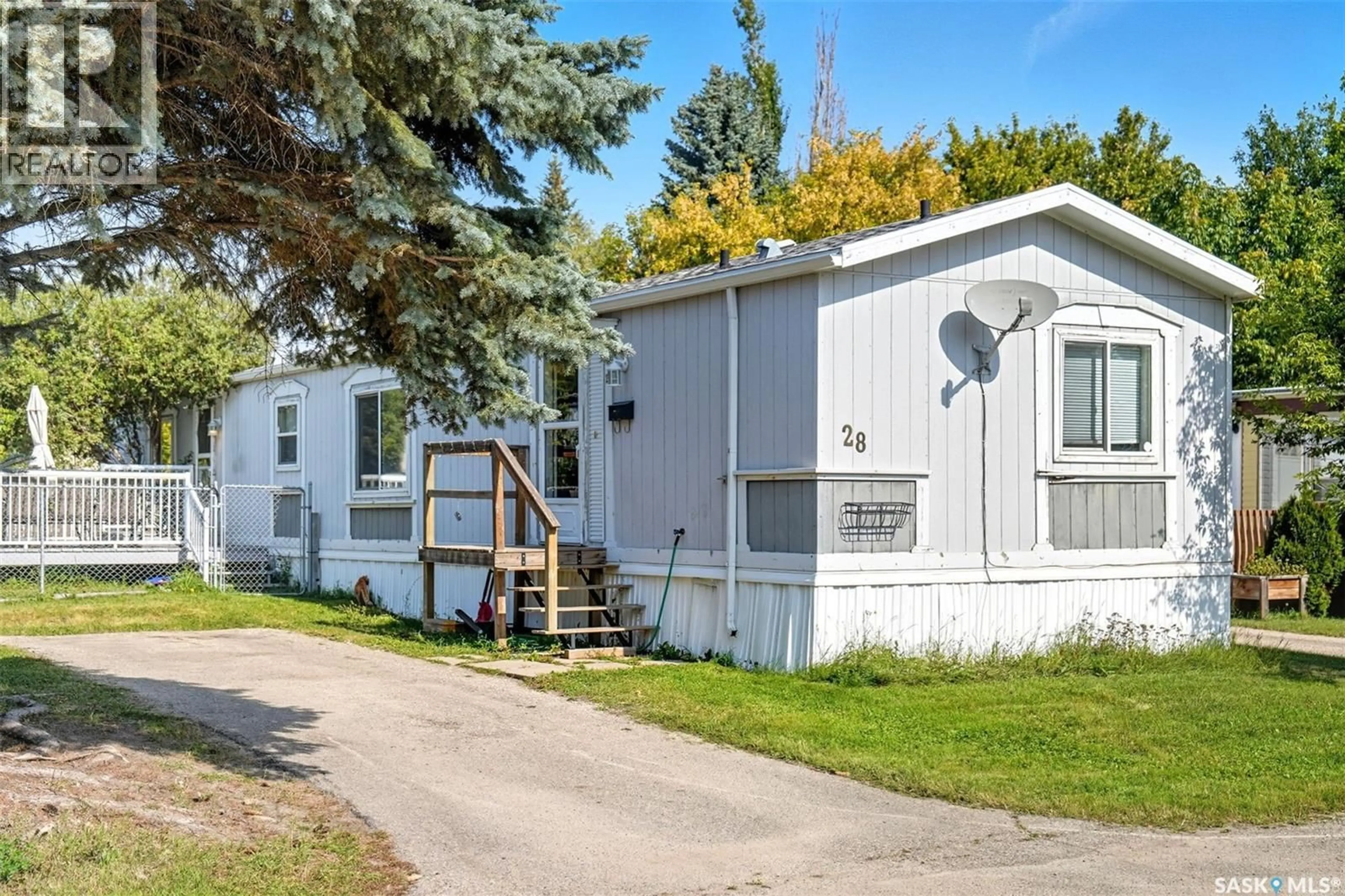 Home with vinyl exterior material, street for 1035 - 28 BOYCHUK DRIVE, Saskatoon Saskatchewan S7H5B2