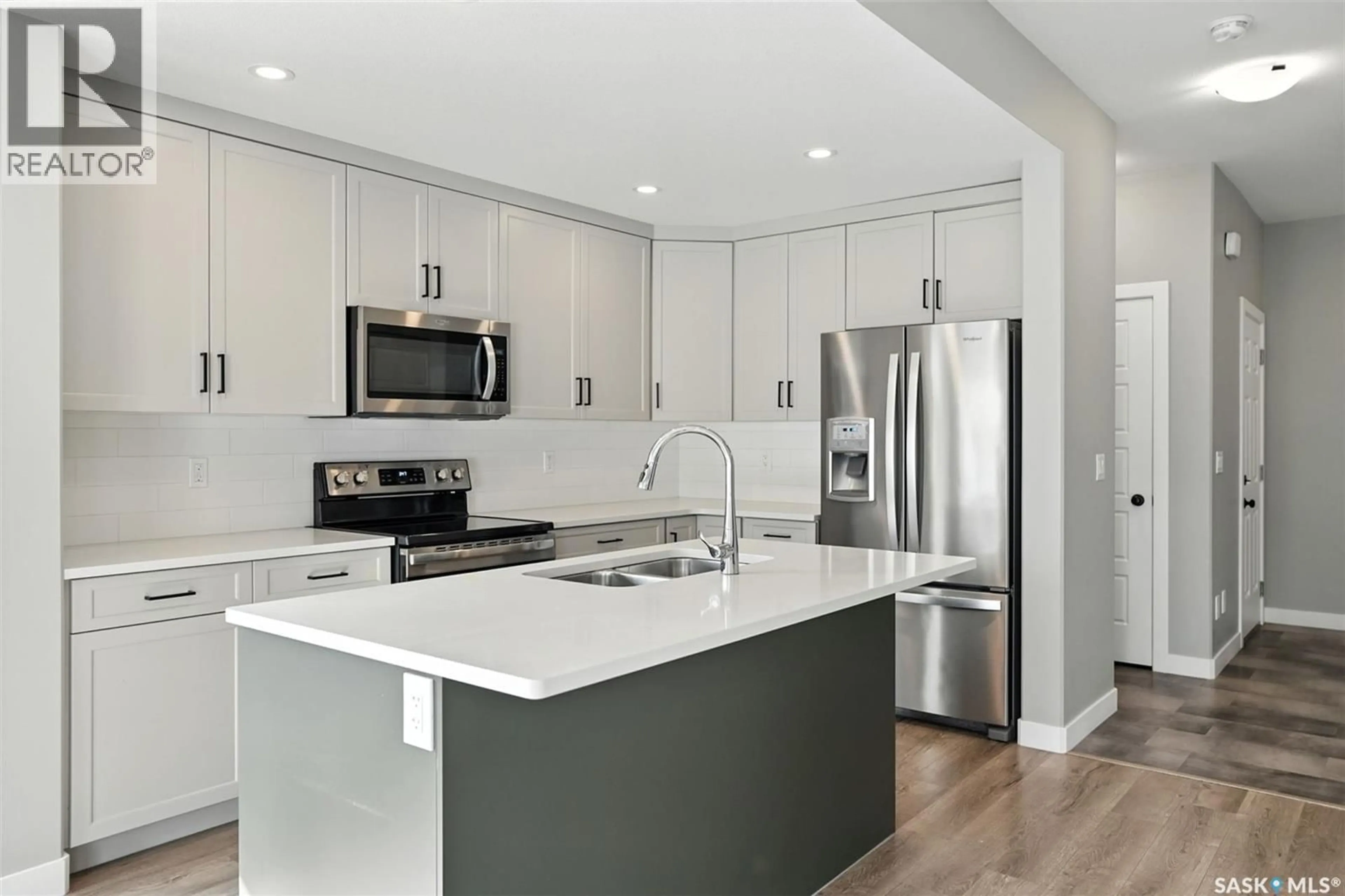 Open concept kitchen, unknown for 240 BARRETT STREET, Saskatoon Saskatchewan S7W1C7
