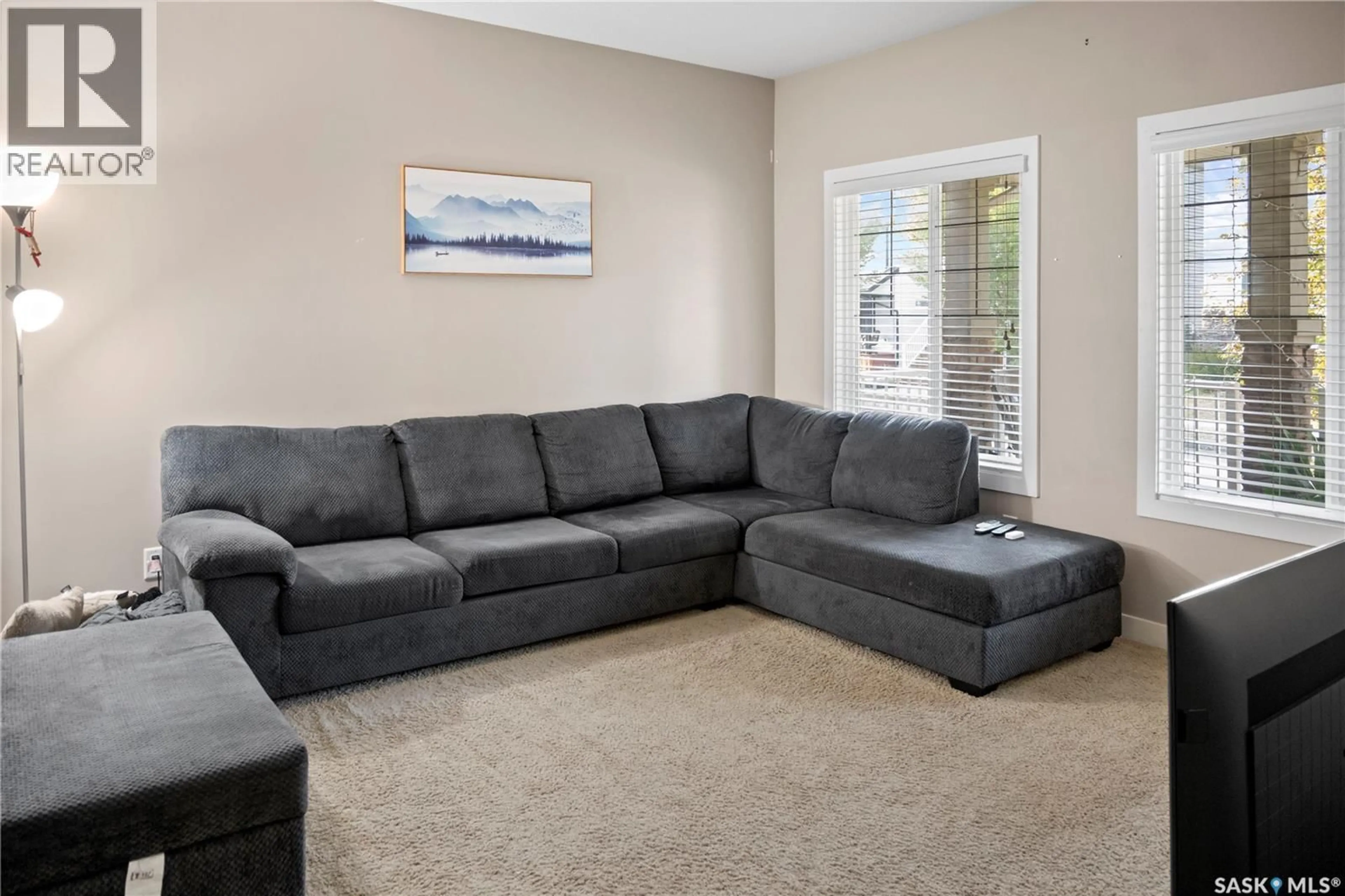 Living room with furniture, carpet floor for 5321 MCCLELLAND DRIVE, Regina Saskatchewan S4W0K7