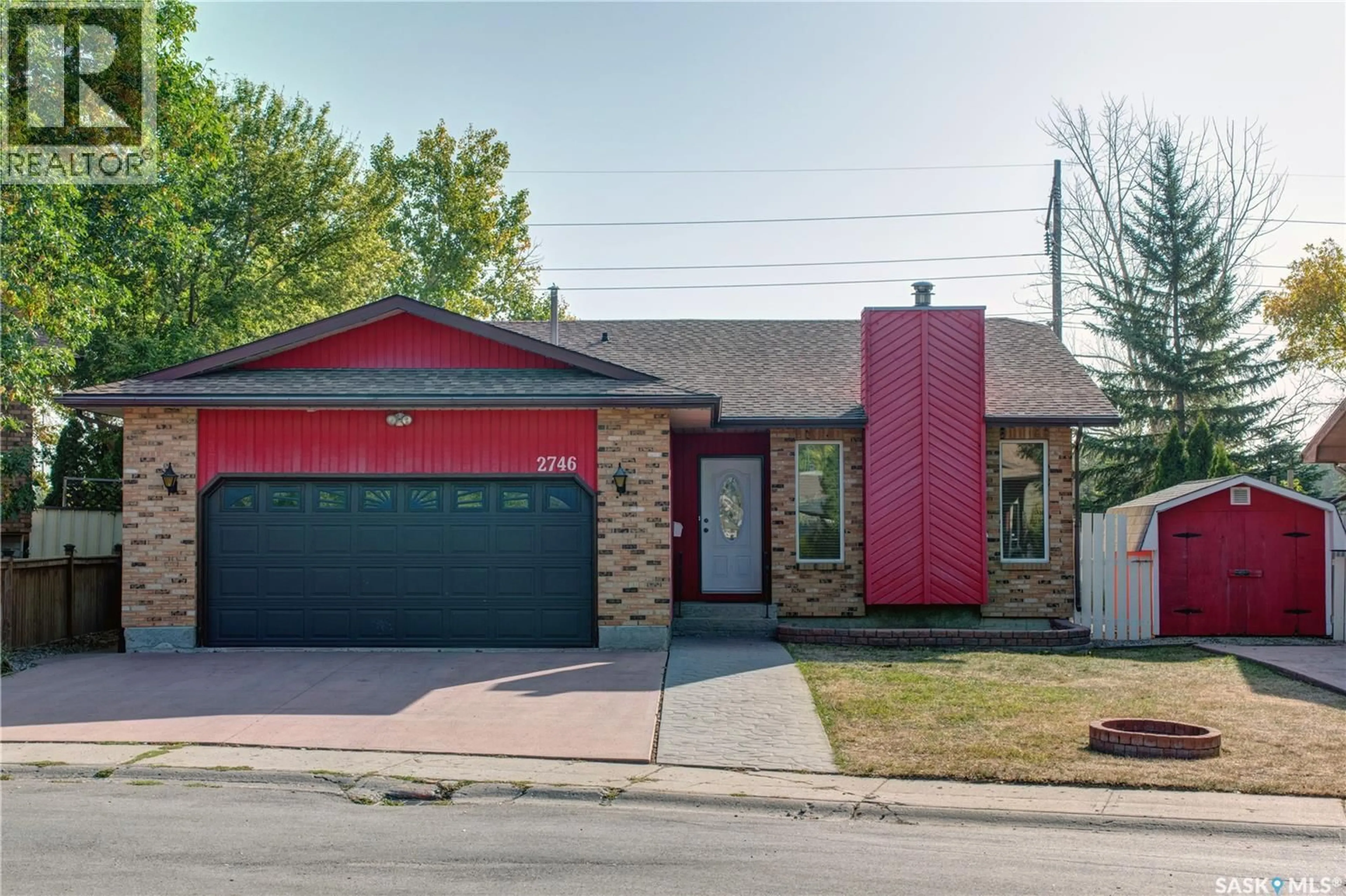 Home with brick exterior material, street for 2746 PARTRIDGE CRESCENT, Regina Saskatchewan S4R8J5