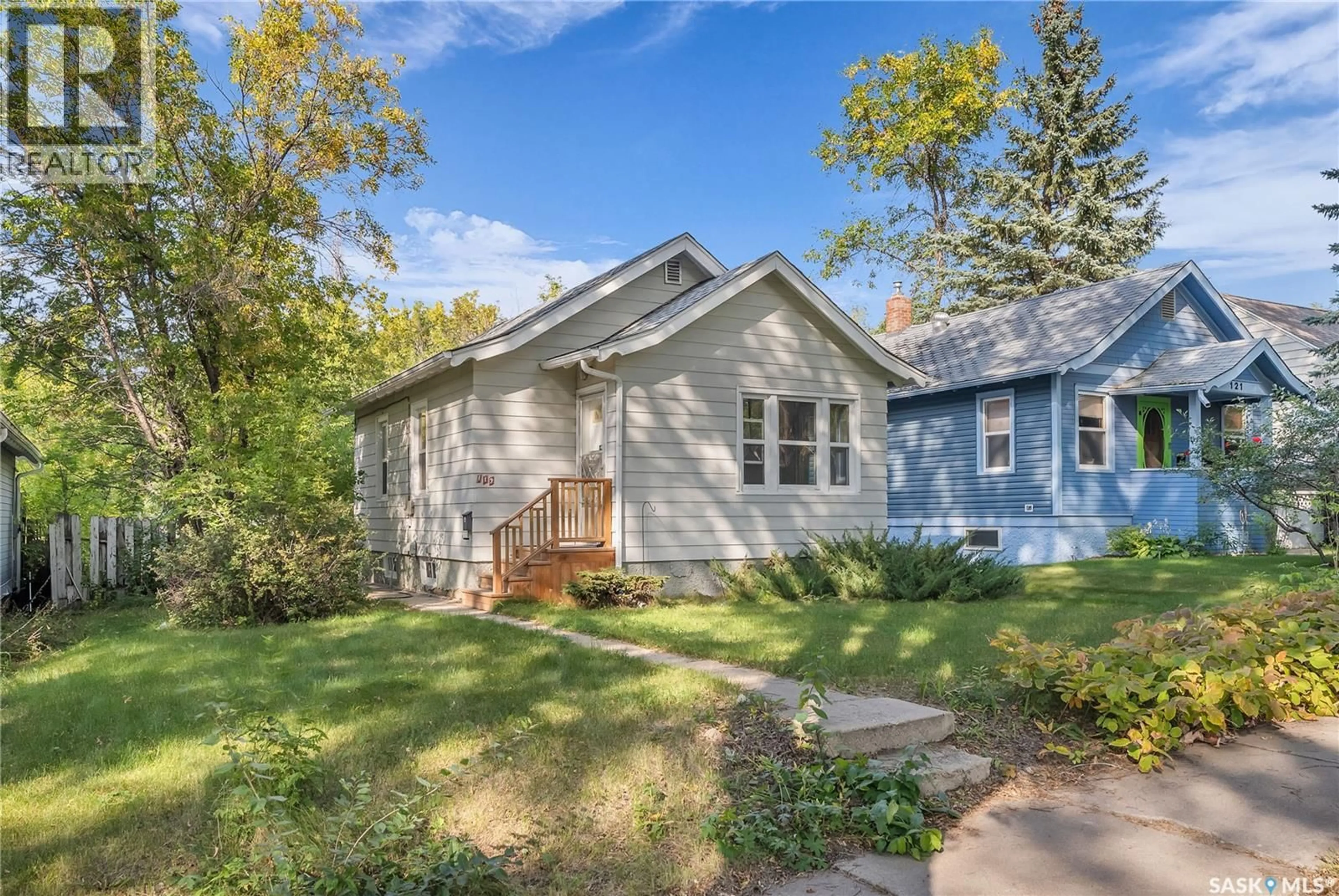Home with vinyl exterior material, street for 119 MAPLE STREET, Saskatoon Saskatchewan S7J0A2