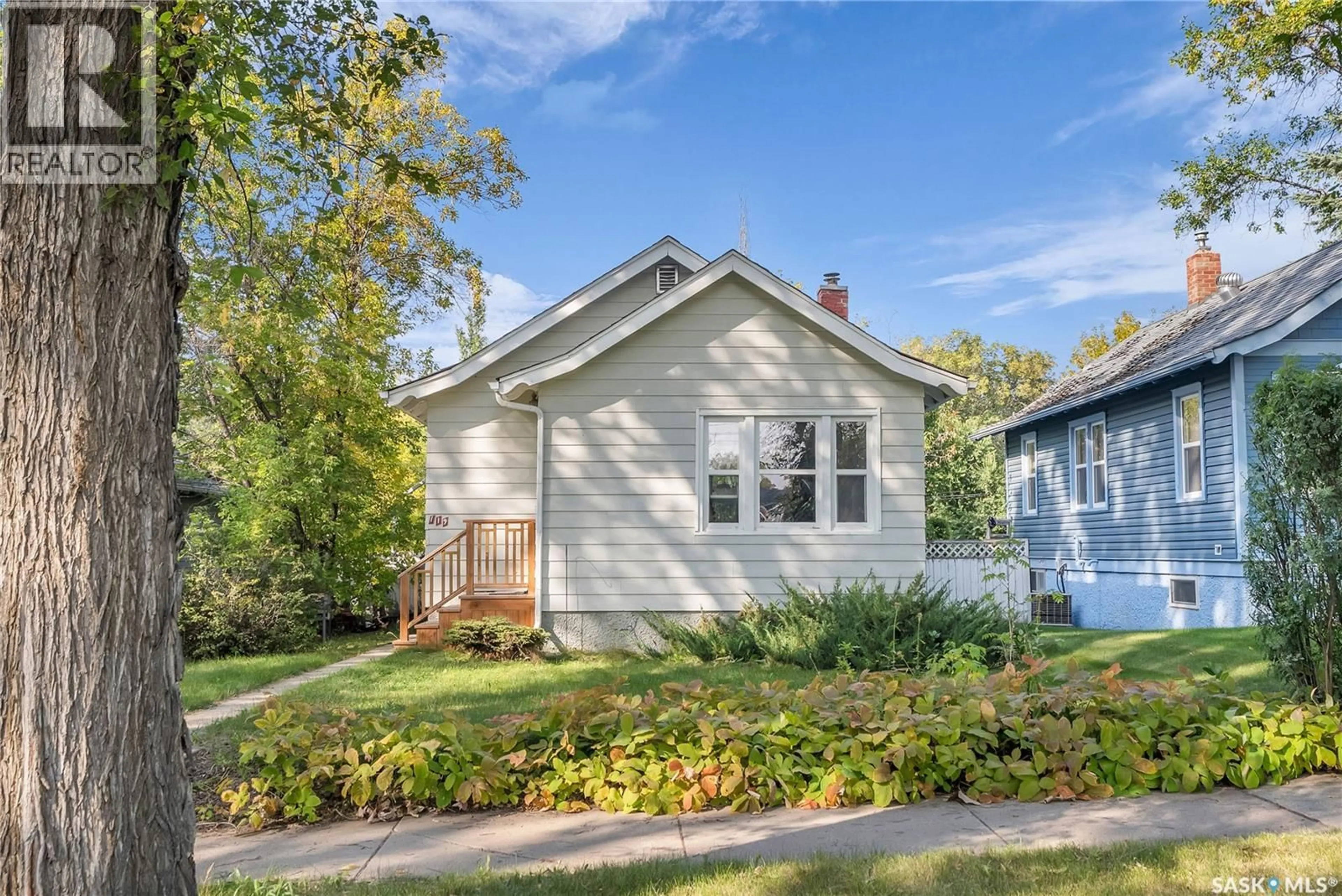 Home with vinyl exterior material, street for 119 MAPLE STREET, Saskatoon Saskatchewan S7J0A2