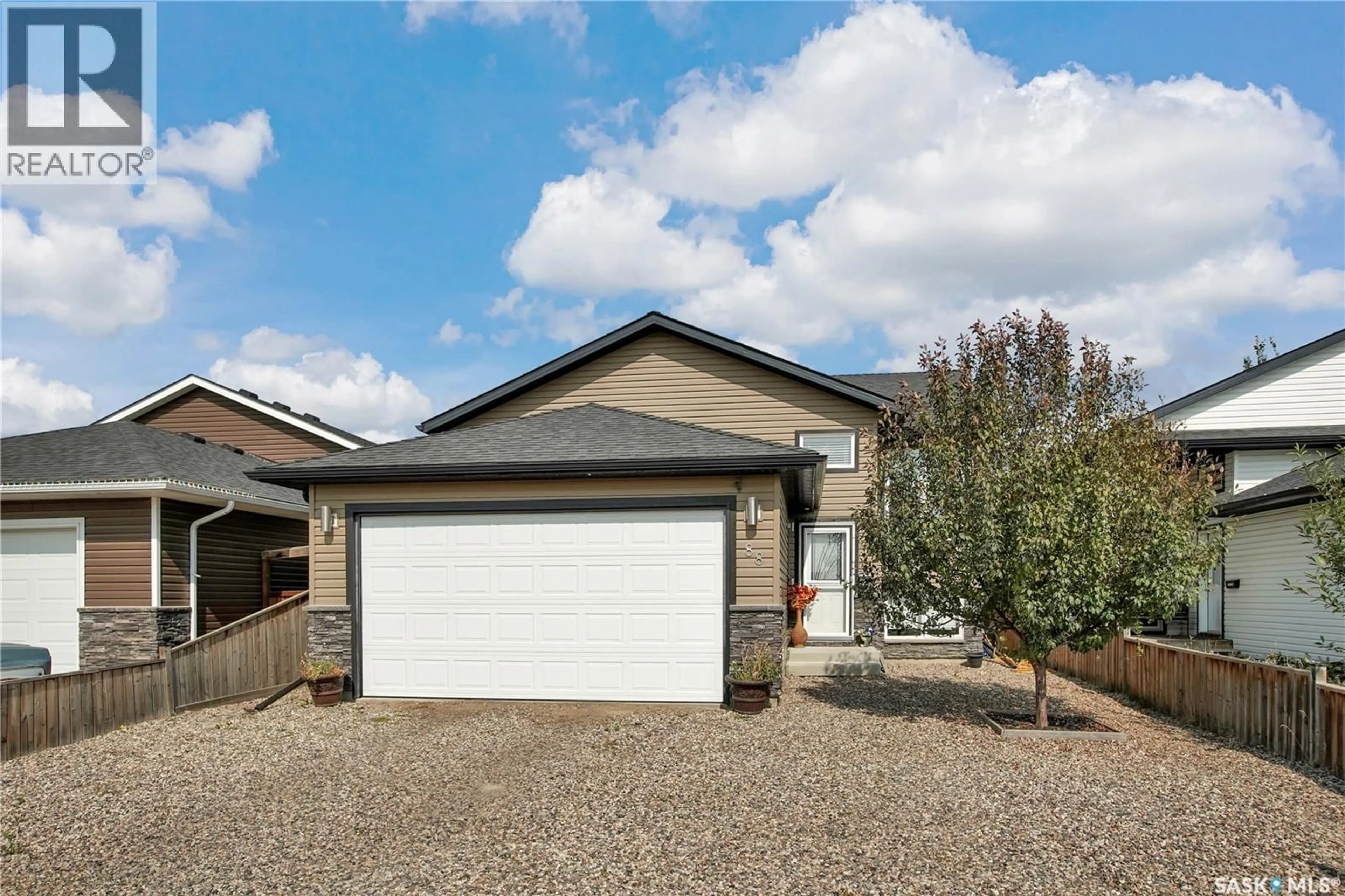 Home with vinyl exterior material, street for 88 MARTENS CRESCENT, Warman Saskatchewan S0K4S3