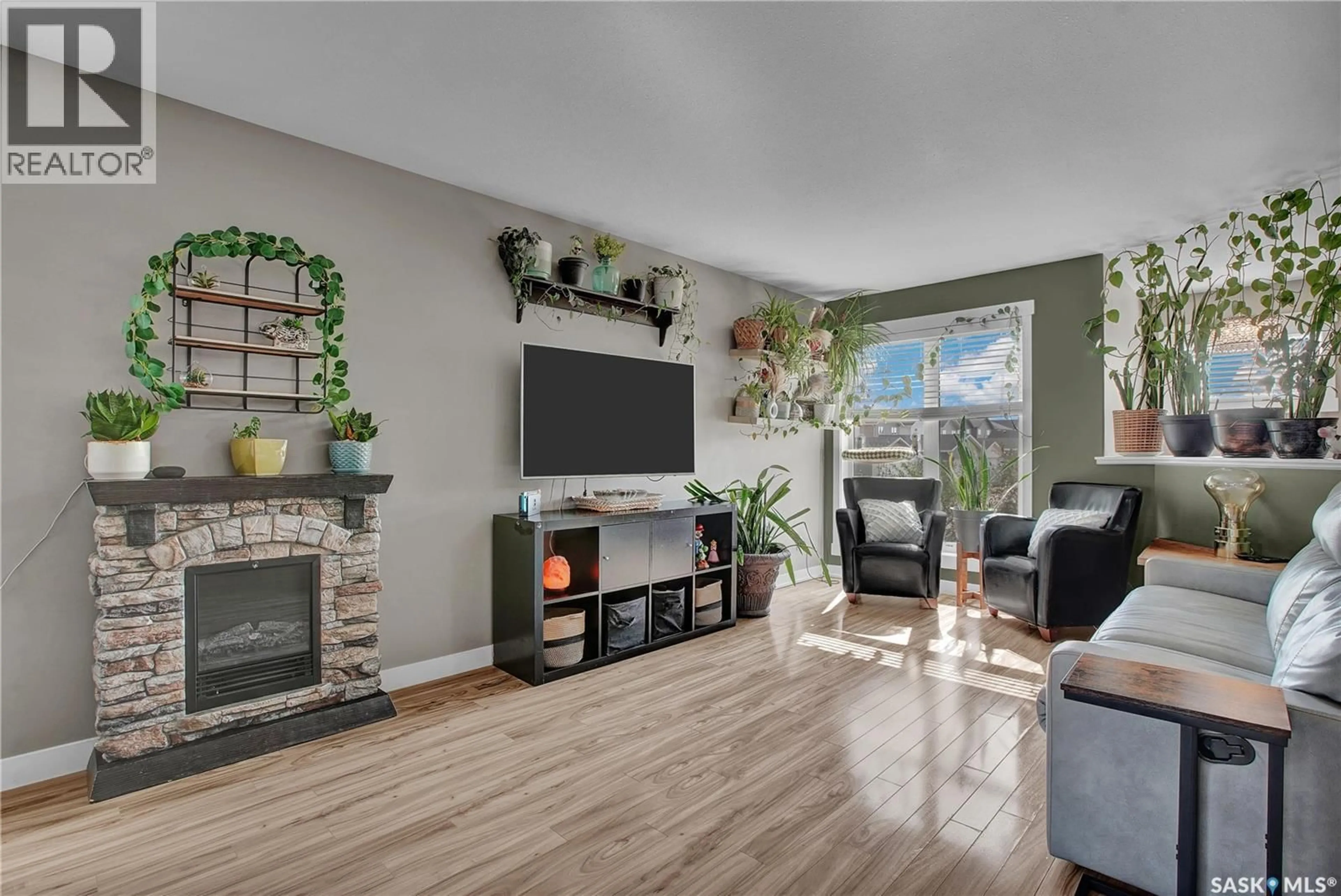 Living room with furniture, unknown for 88 MARTENS CRESCENT, Warman Saskatchewan S0K4S3