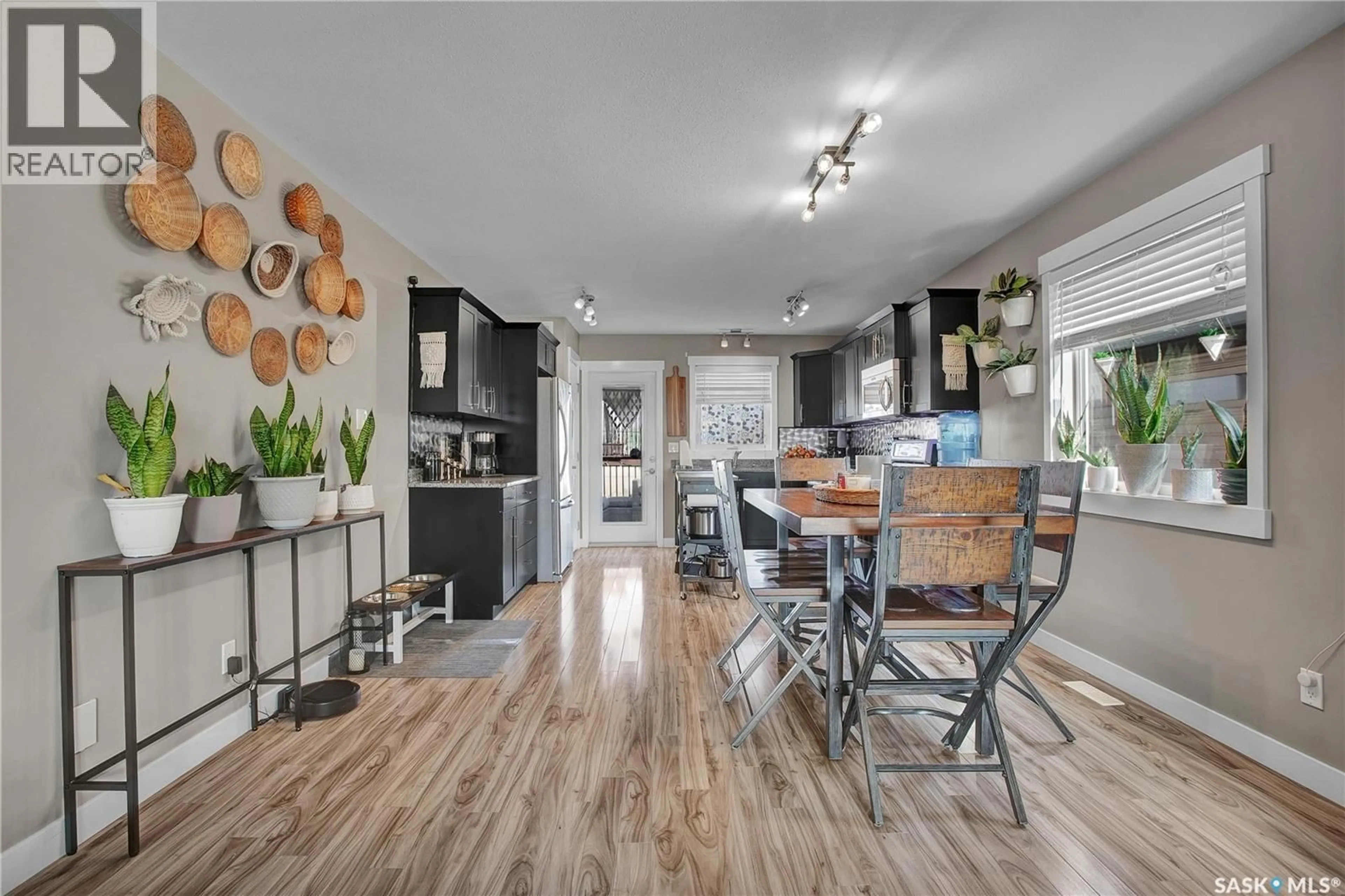 Open concept kitchen, wood/laminate floor for 88 MARTENS CRESCENT, Warman Saskatchewan S0K4S3