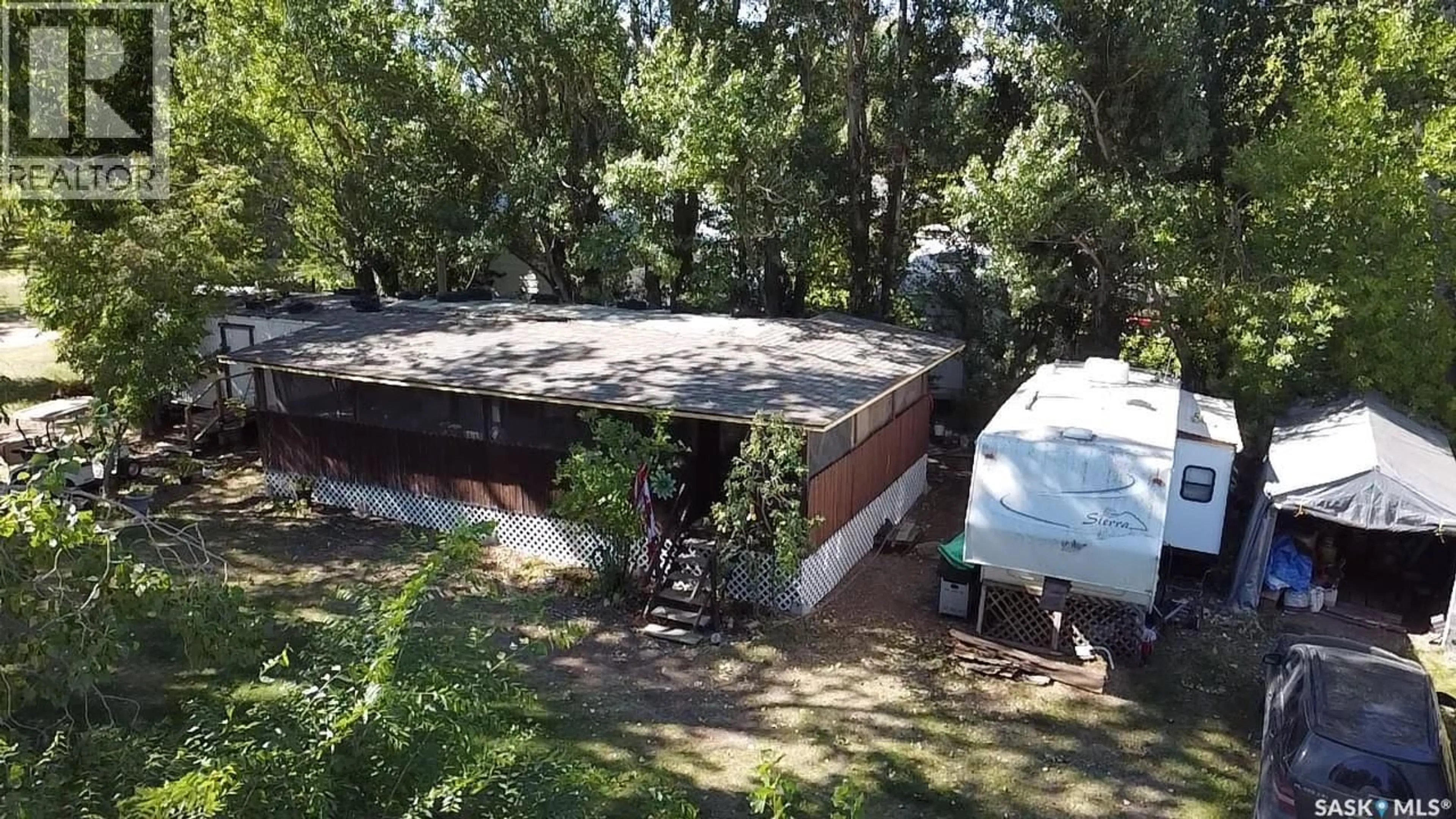 A pic from outside/outdoor area/front of a property/back of a property/a pic from drone, unknown for 414 ZEALANDIA AVENUE, Coteau Beach Saskatchewan S0L0G0