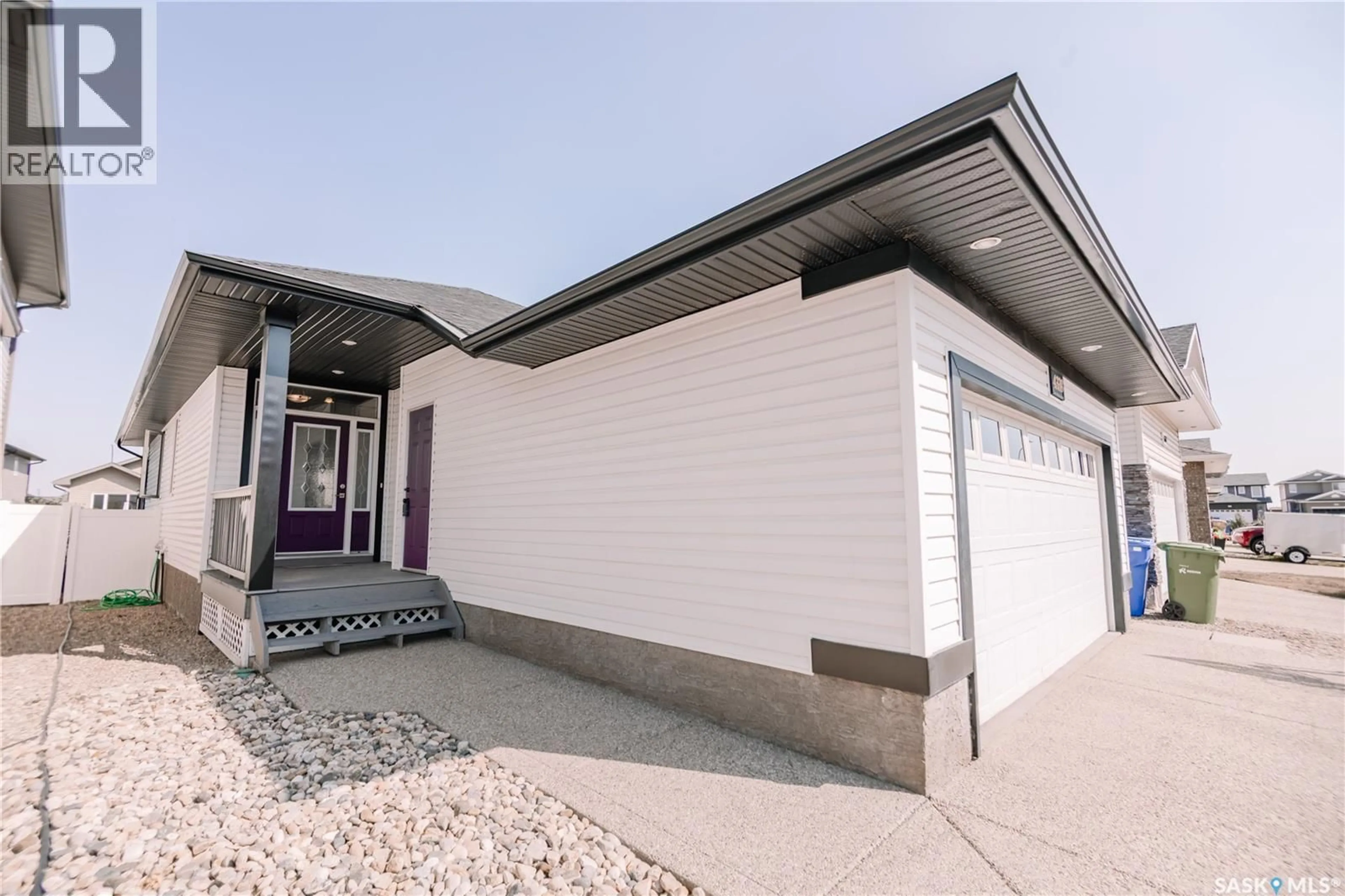 Home with vinyl exterior material, street for 4338 MEADOWSWEET LANE, Regina Saskatchewan S4X0C2