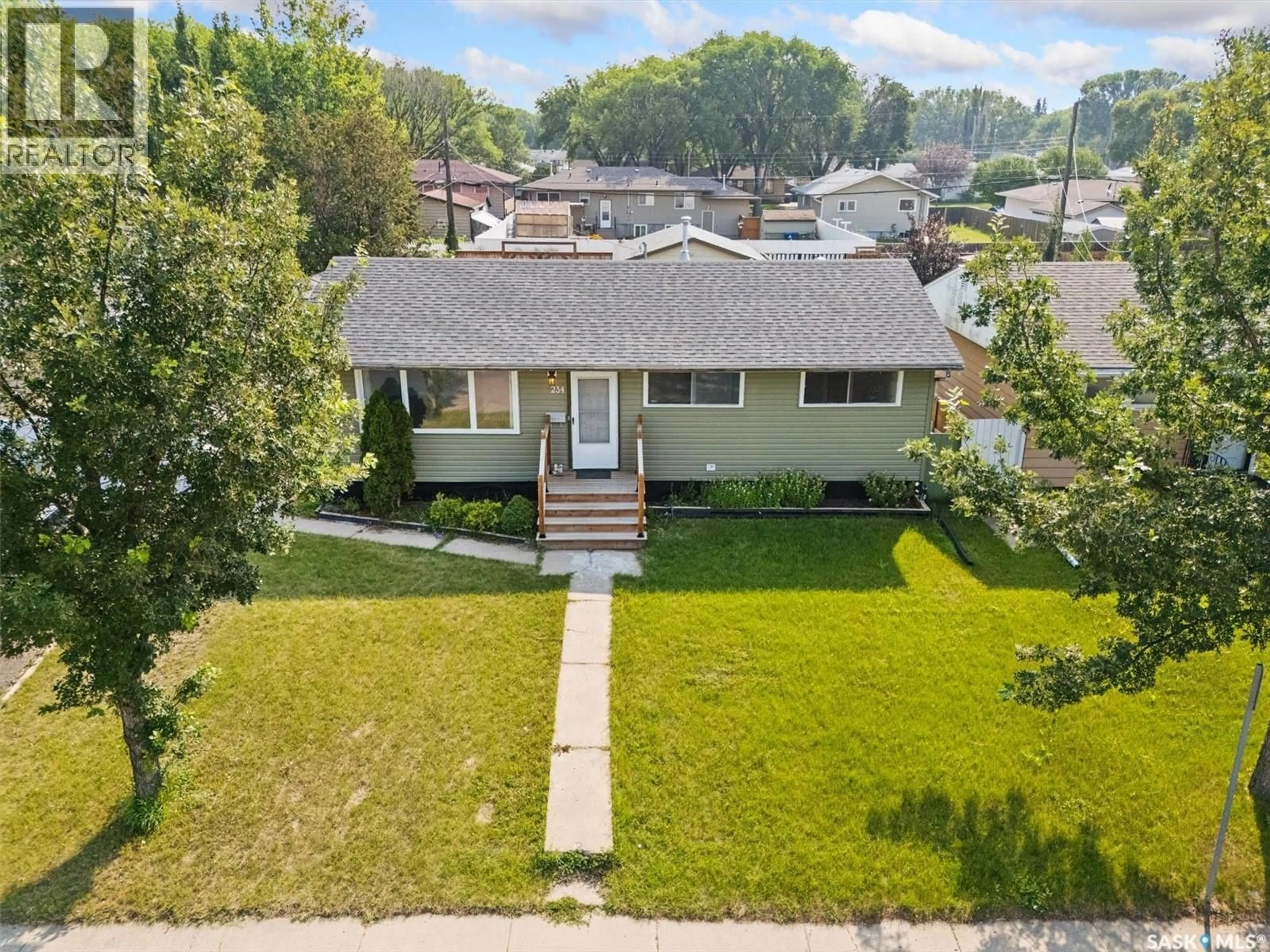 A pic from outside/outdoor area/front of a property/back of a property/a pic from drone, street for 234 WITNEY AVENUE, Saskatoon Saskatchewan S7L3M3