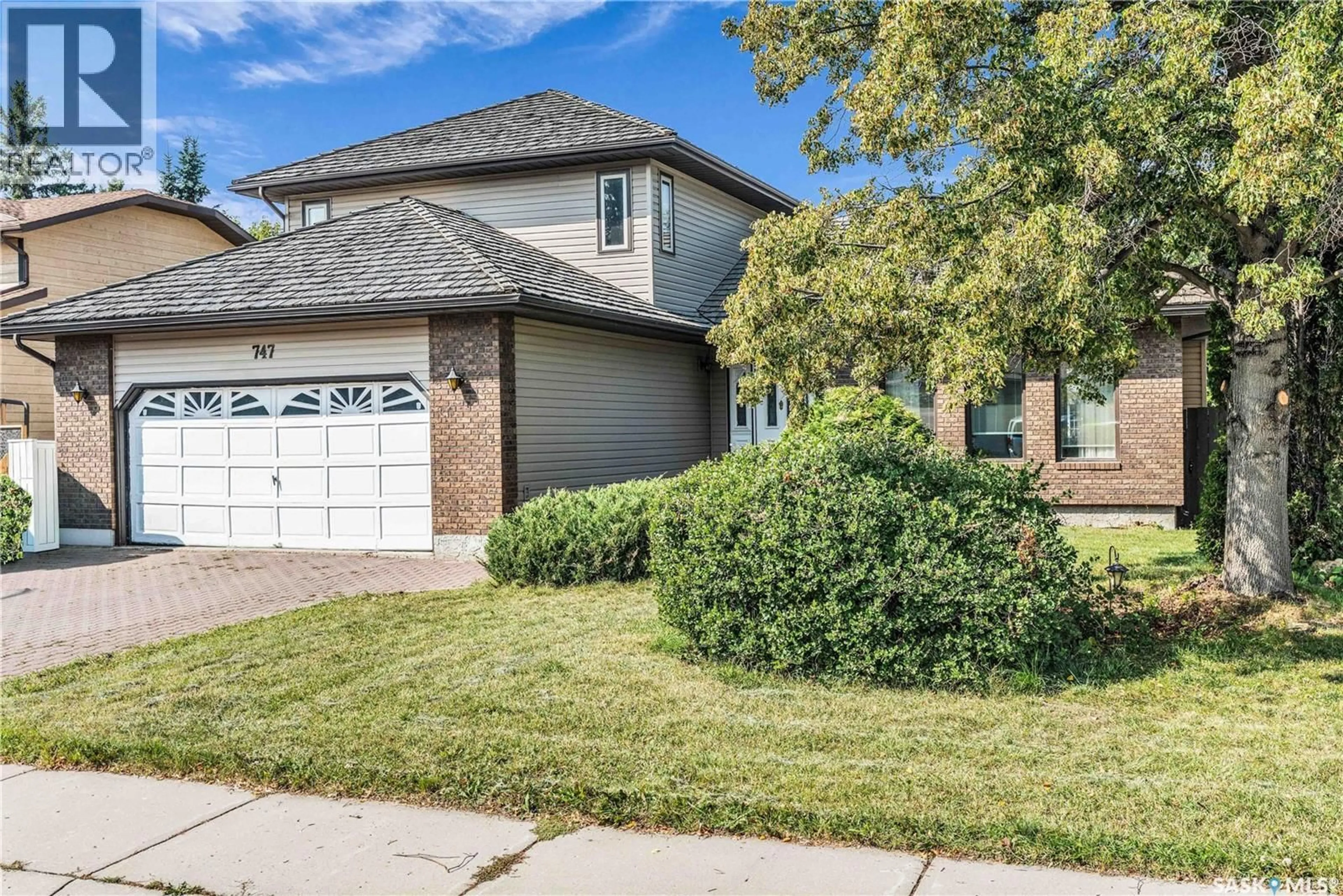 Home with brick exterior material, street for 747 WILKINSON WAY, Saskatoon Saskatchewan S7N3L6
