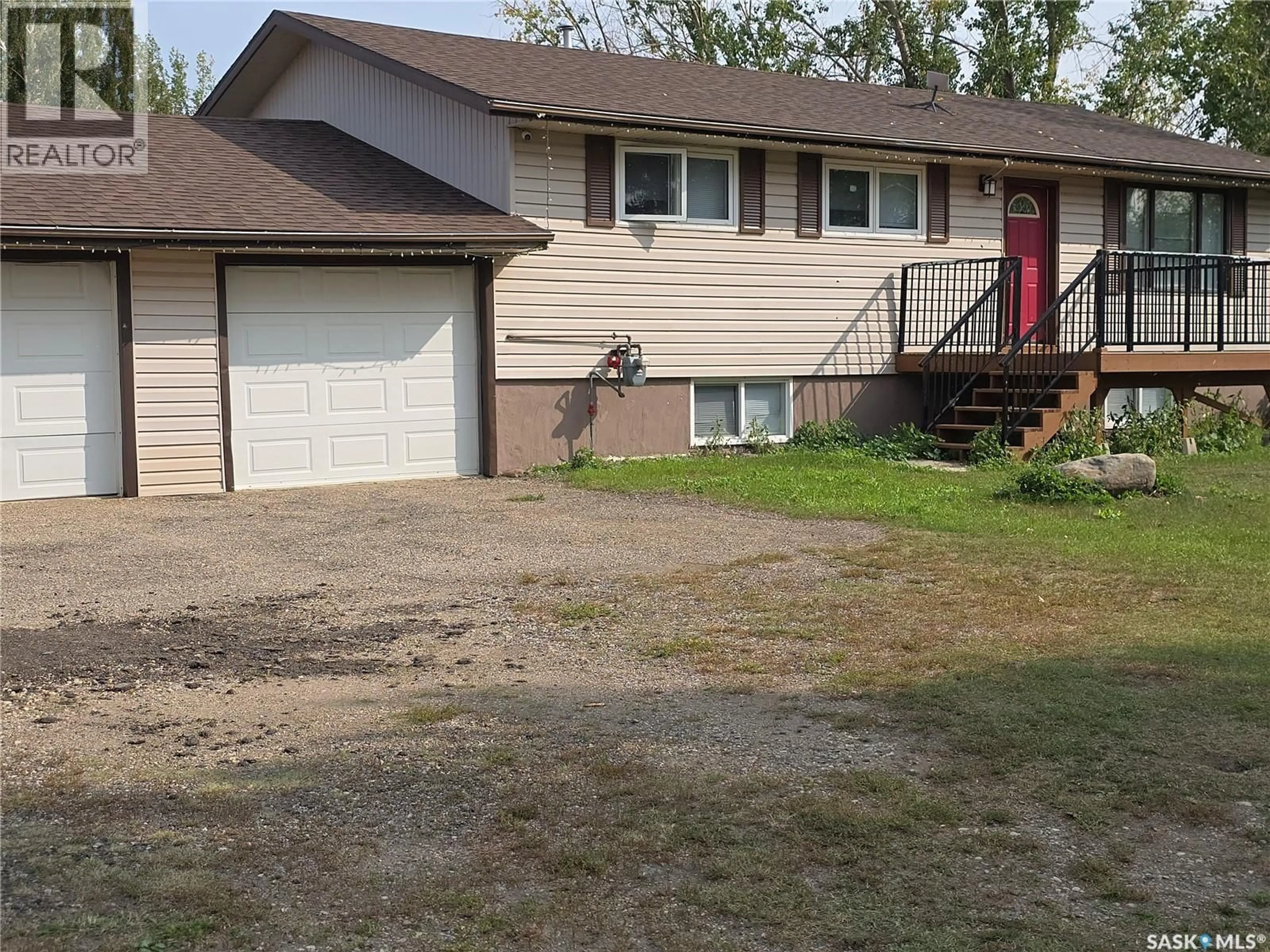Home with vinyl exterior material, street for 5 ACRE DREAM, Corman Park Rm No. 344 Saskatchewan S0K4S0