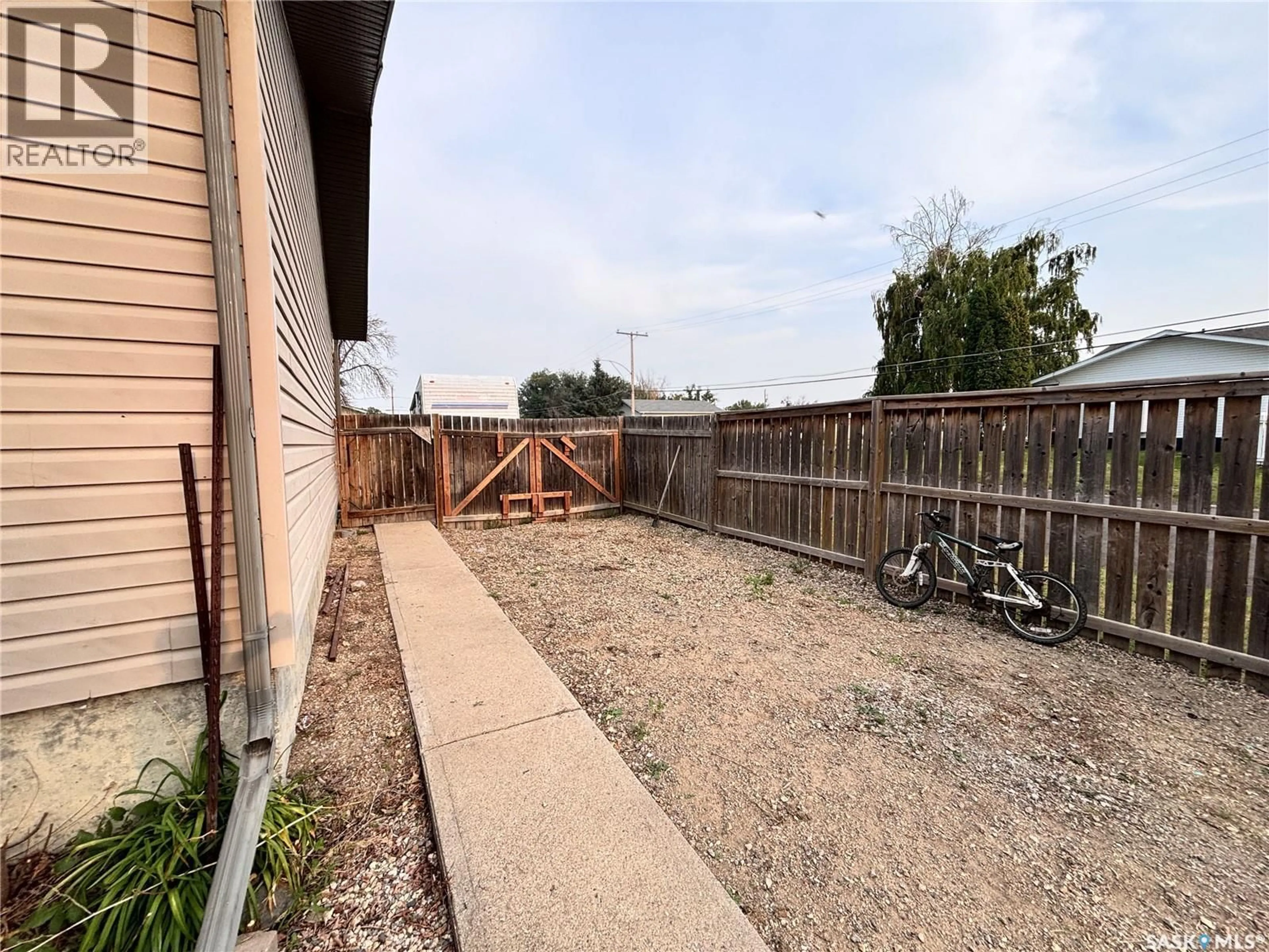 Patio, street for 302 ASH STREET, Outlook Saskatchewan S0L2N0