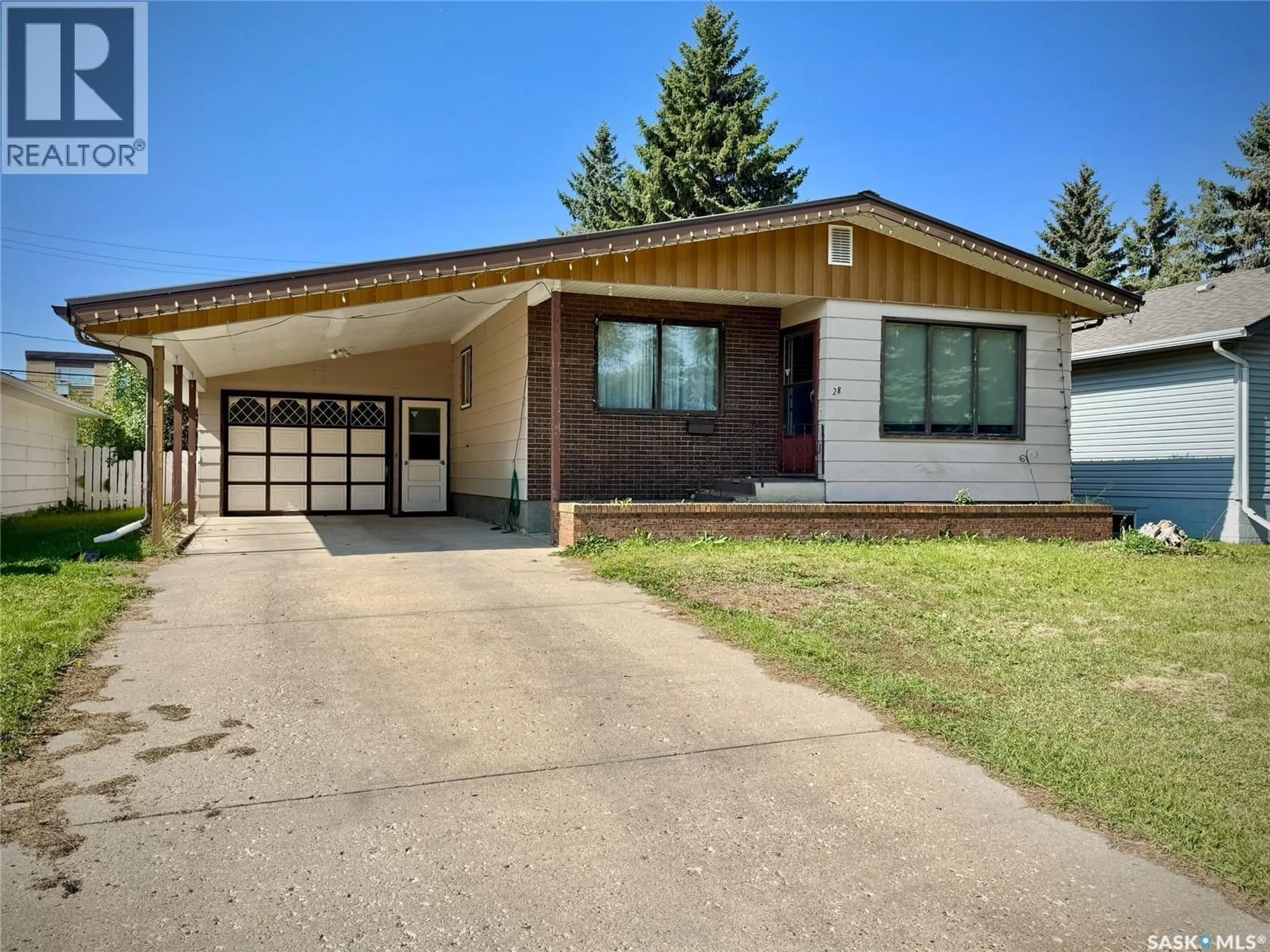 Home with brick exterior material, street for 28 CLARKE AVENUE, Yorkton Saskatchewan S3N2M3