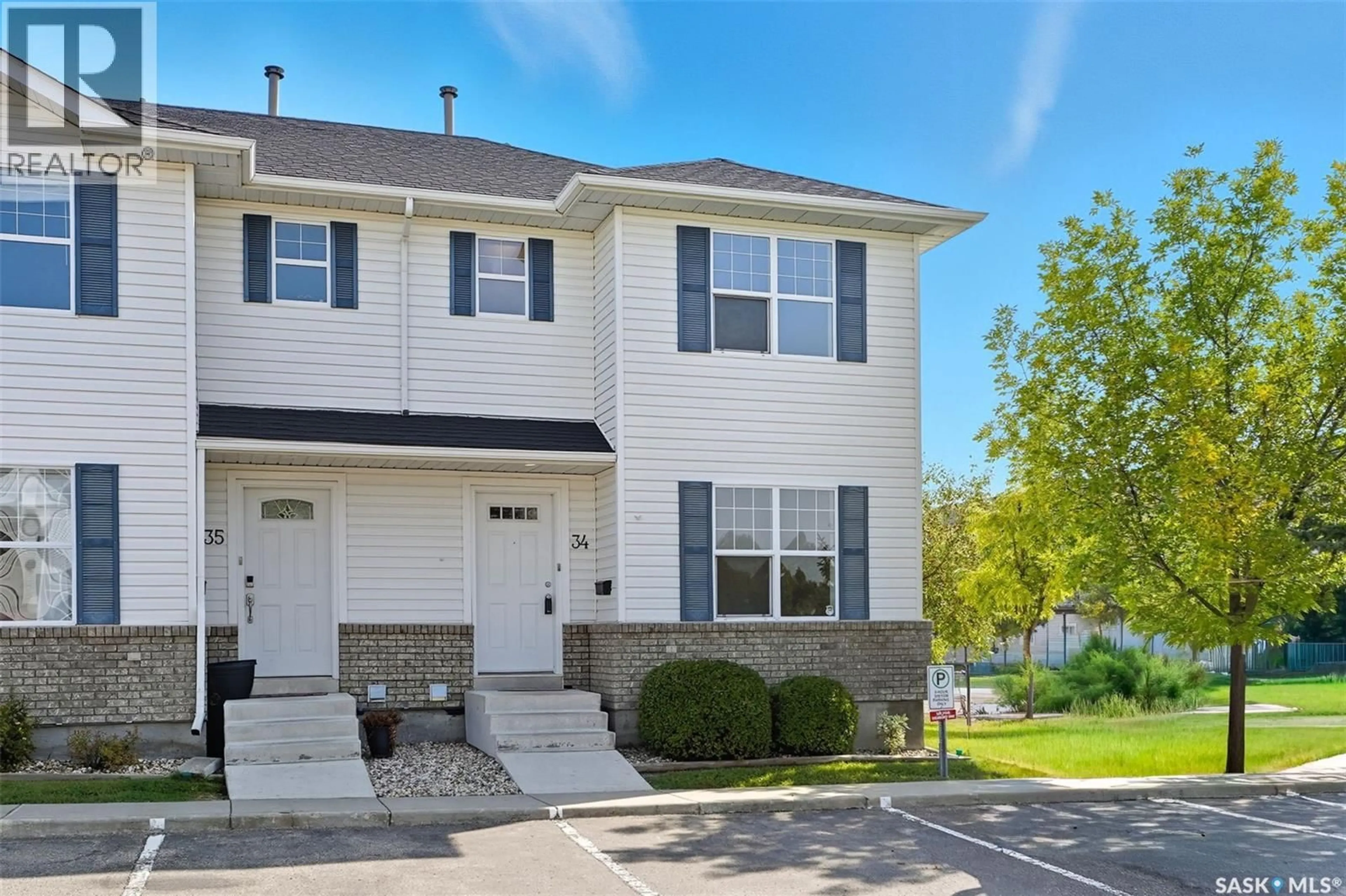 Home with vinyl exterior material, street for 34 203 HEROLD TERRACE, Saskatoon Saskatchewan S7V1H3