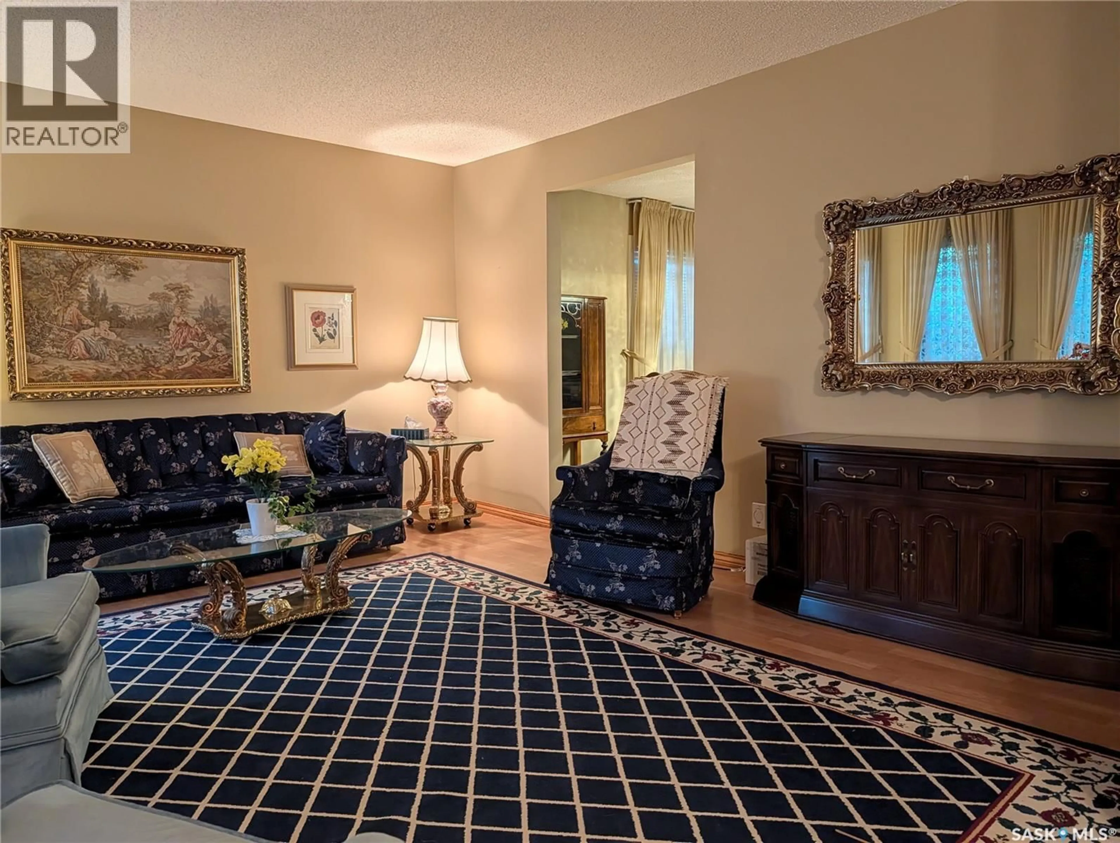 Living room with furniture, carpet floor for 215 DALGLIESH DRIVE, Regina Saskatchewan S4R7Z6