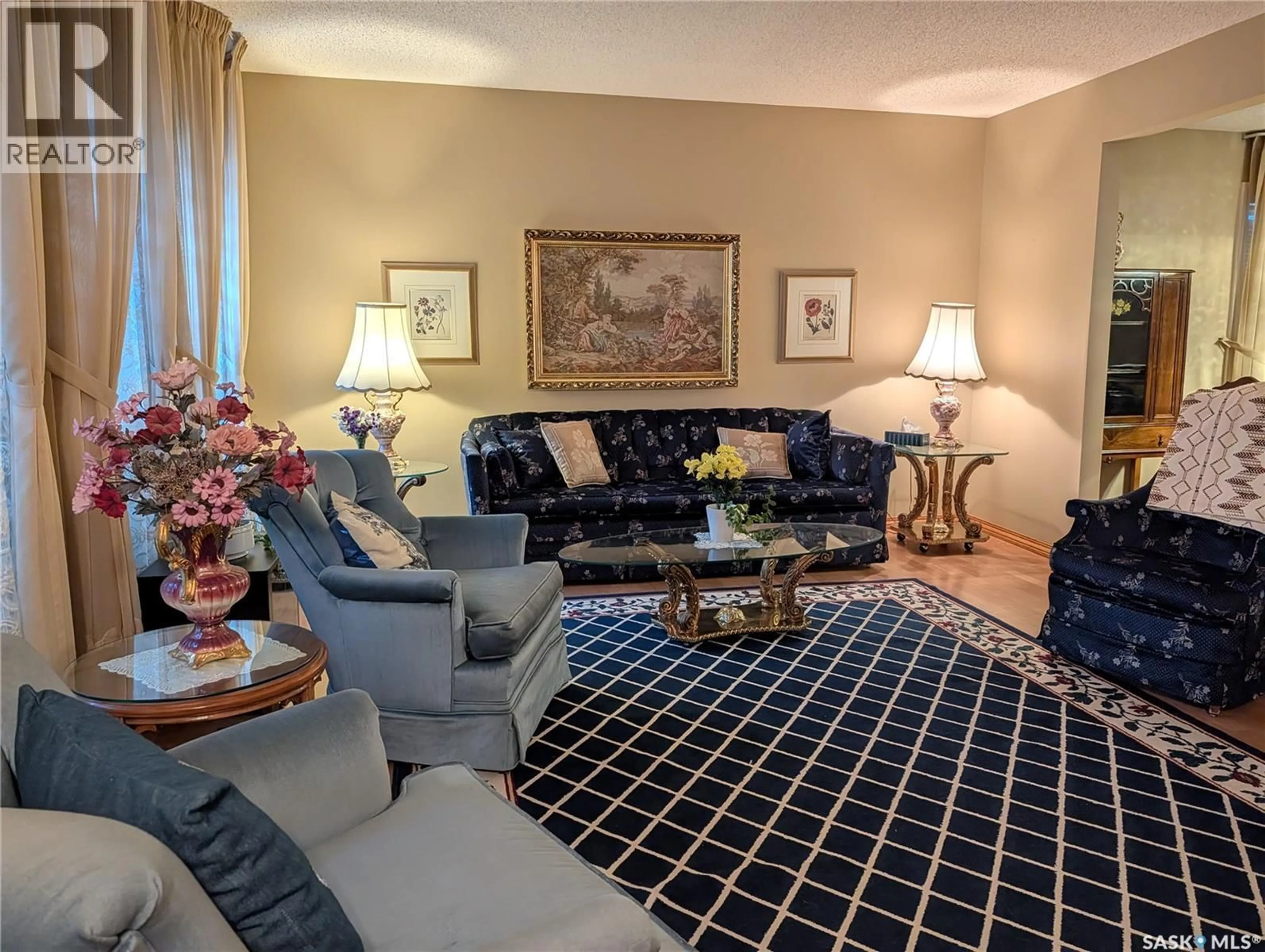 Living room with furniture, carpet floor for 215 DALGLIESH DRIVE, Regina Saskatchewan S4R7Z6