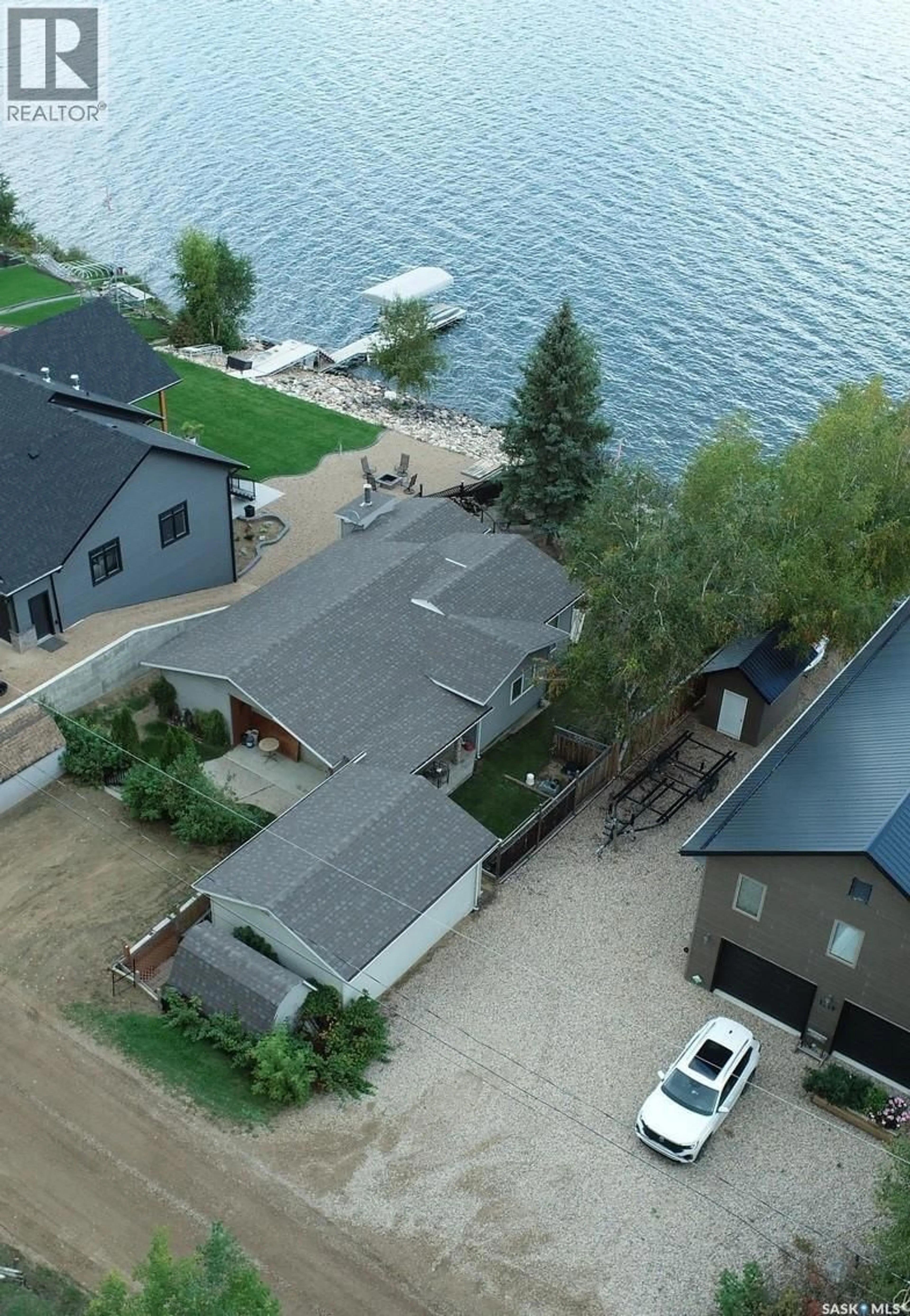 A pic from outside/outdoor area/front of a property/back of a property/a pic from drone, water/lake/river/ocean view for 1118 BIRCH AVENUE, Tobin Lake Saskatchewan S0E1E0