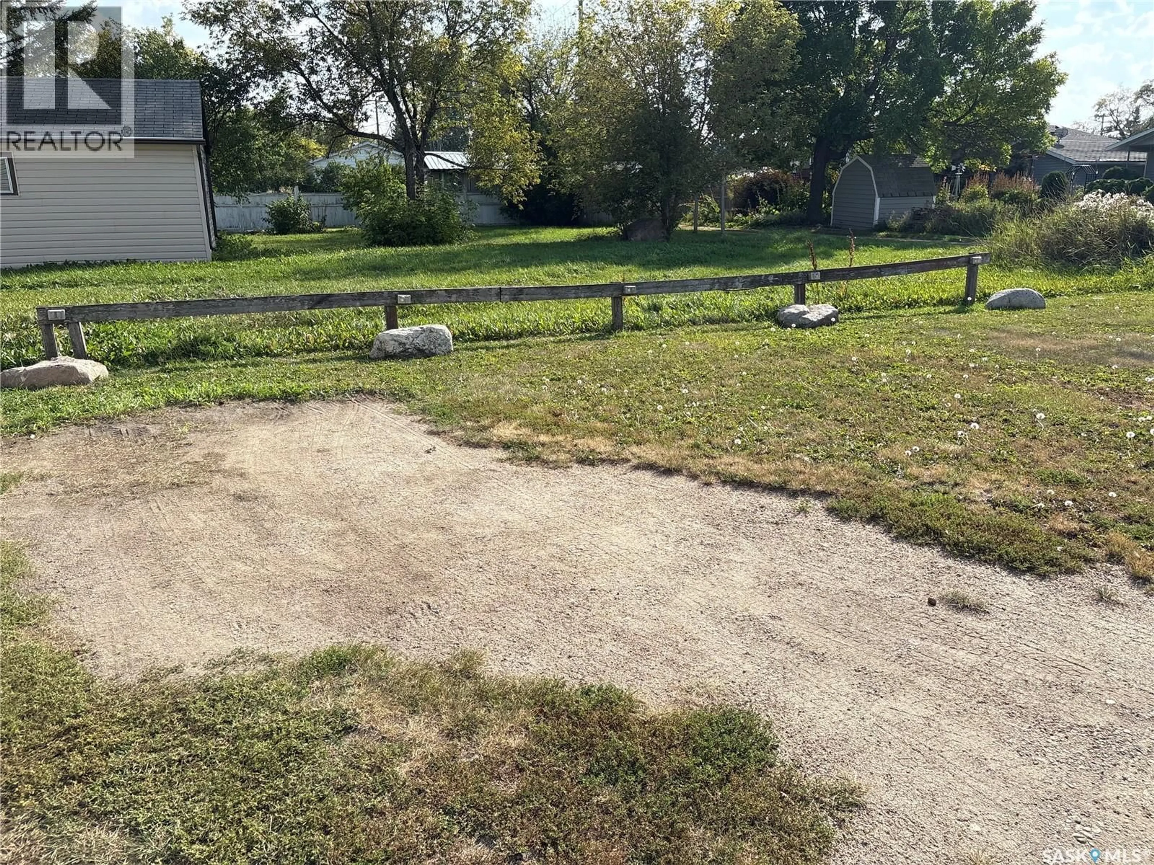 A pic from outside/outdoor area/front of a property/back of a property/a pic from drone, unknown for 323 9TH STREET, Humboldt Saskatchewan S0K2A0