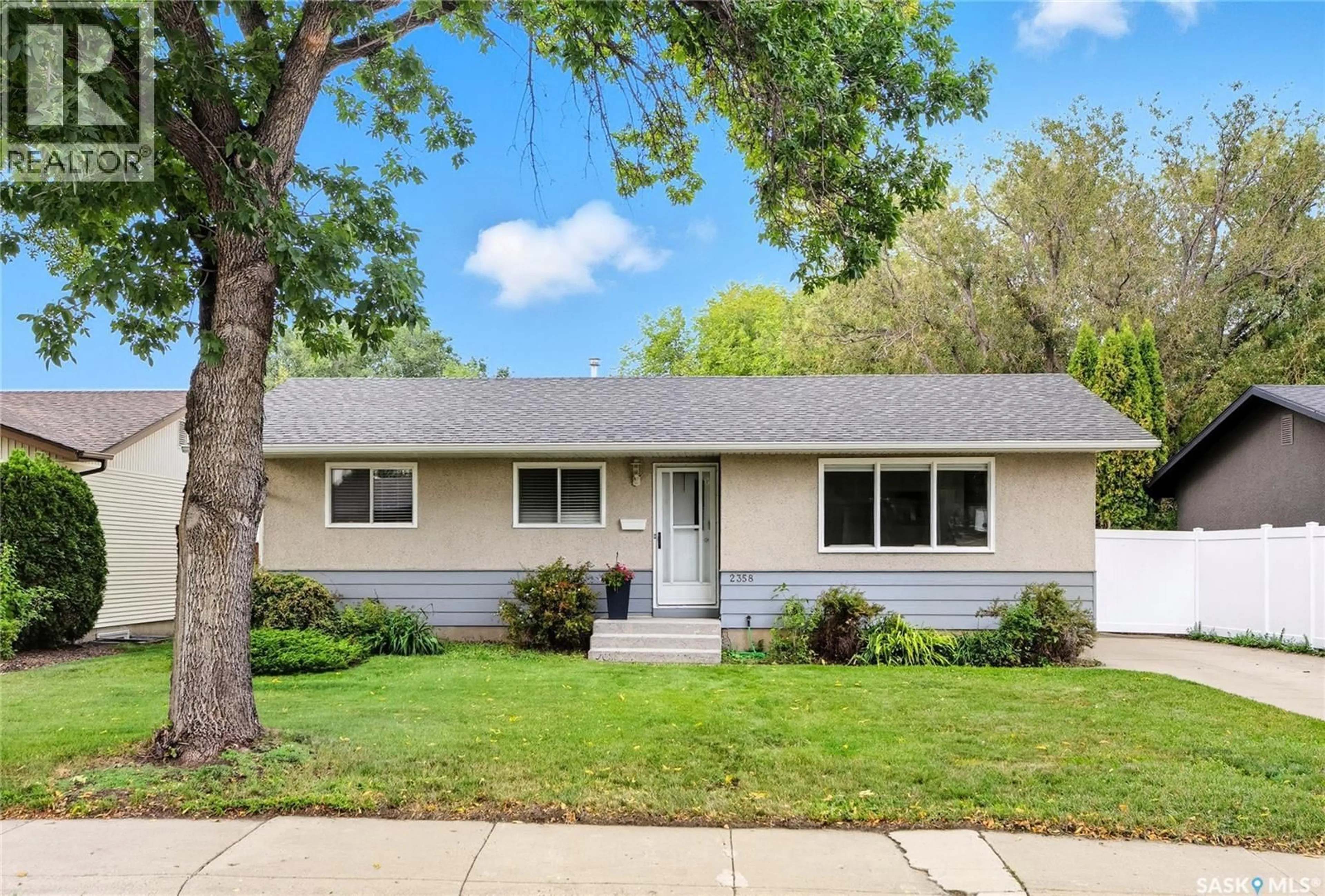 Home with vinyl exterior material, street for 2358 EASTHILL, Saskatoon Saskatchewan S7J3E5