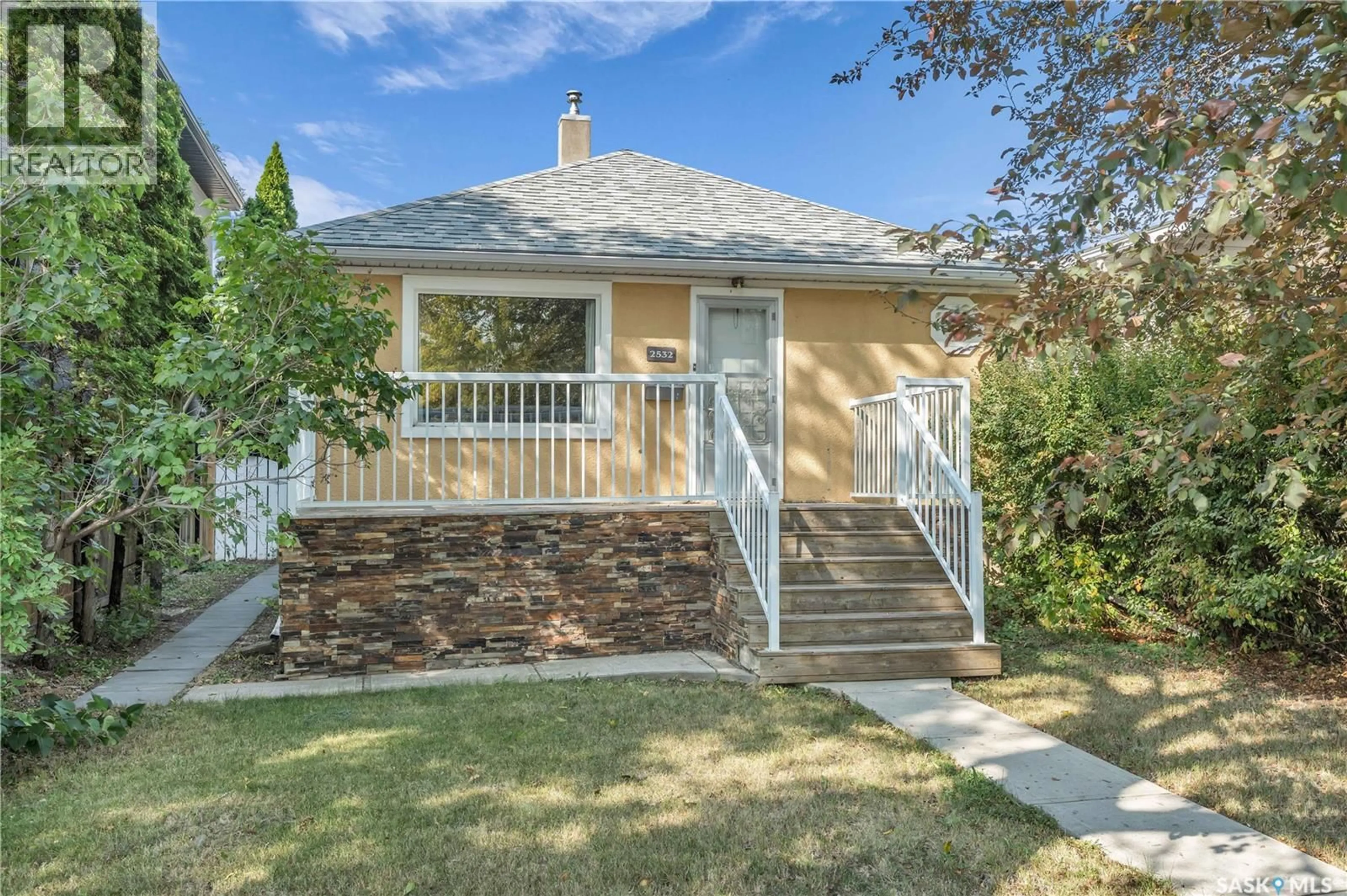 Home with vinyl exterior material, street for 2532 REYNOLDS STREET, Regina Saskatchewan S4N3N9