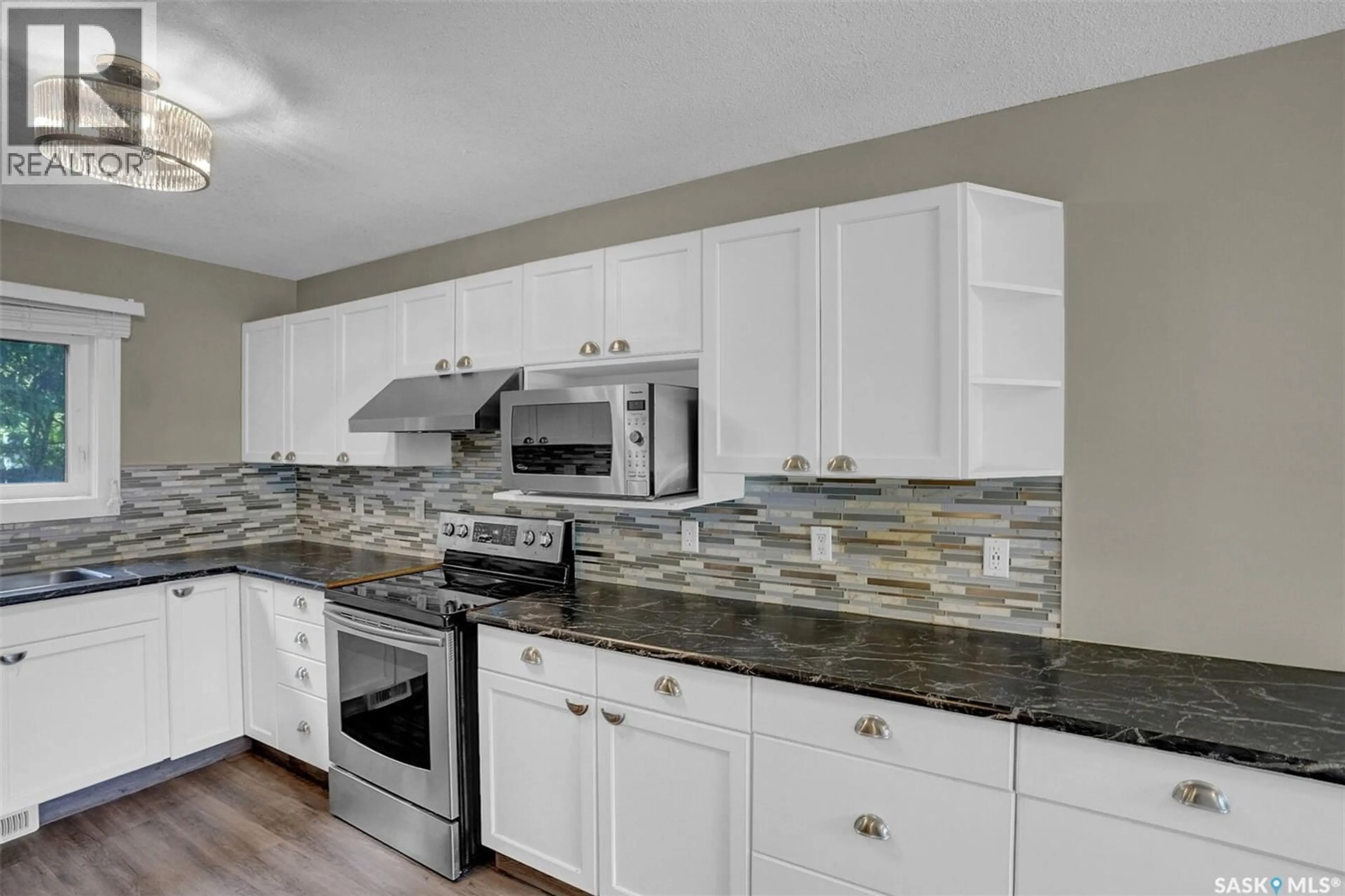 Open concept kitchen, ceramic/tile floor for 1724 GRANT DRIVE, Regina Saskatchewan S4S4V4