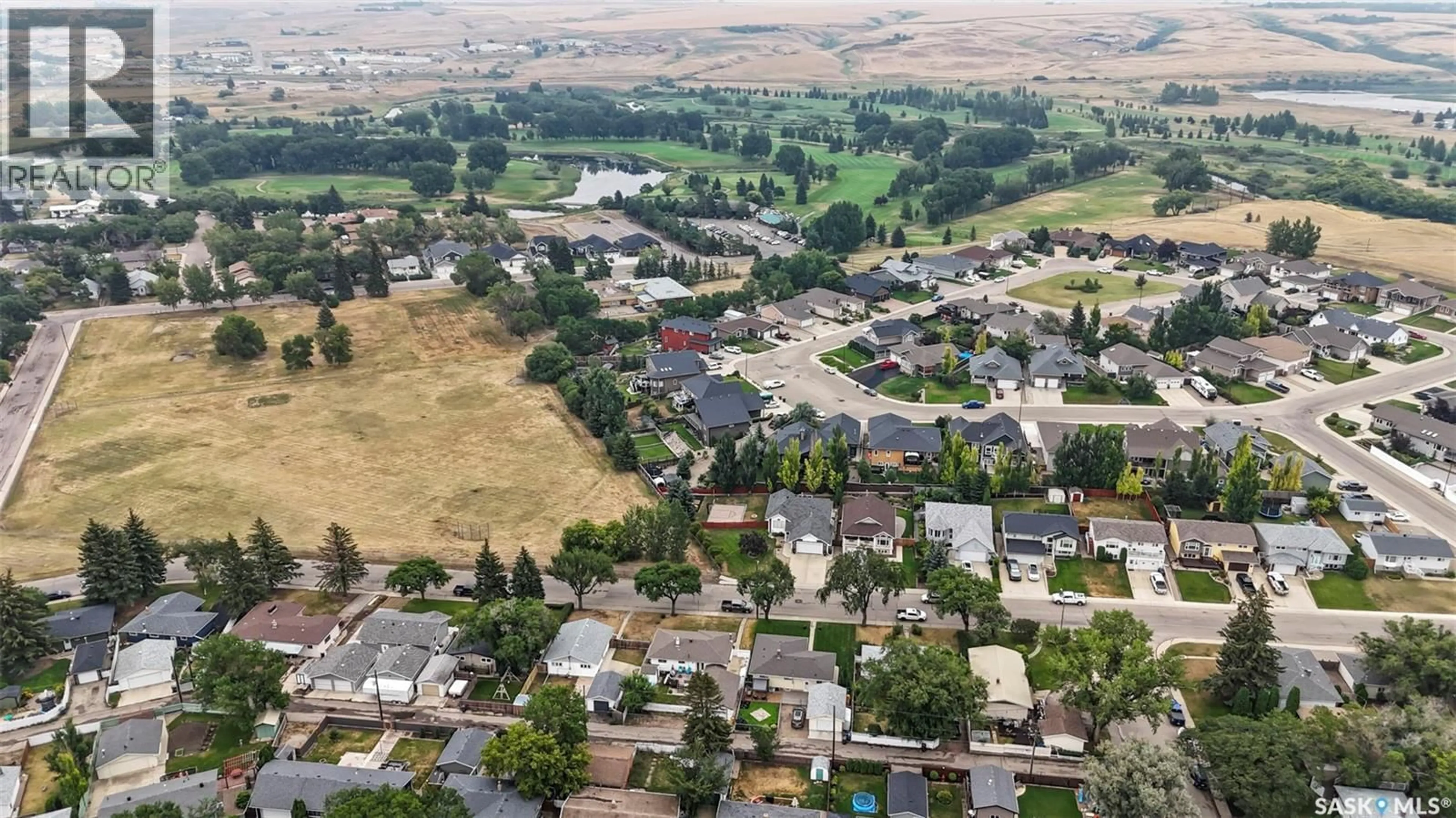A pic from outside/outdoor area/front of a property/back of a property/a pic from drone, mountain view for 474 4TH AVENUE, Swift Current Saskatchewan S9H3M1