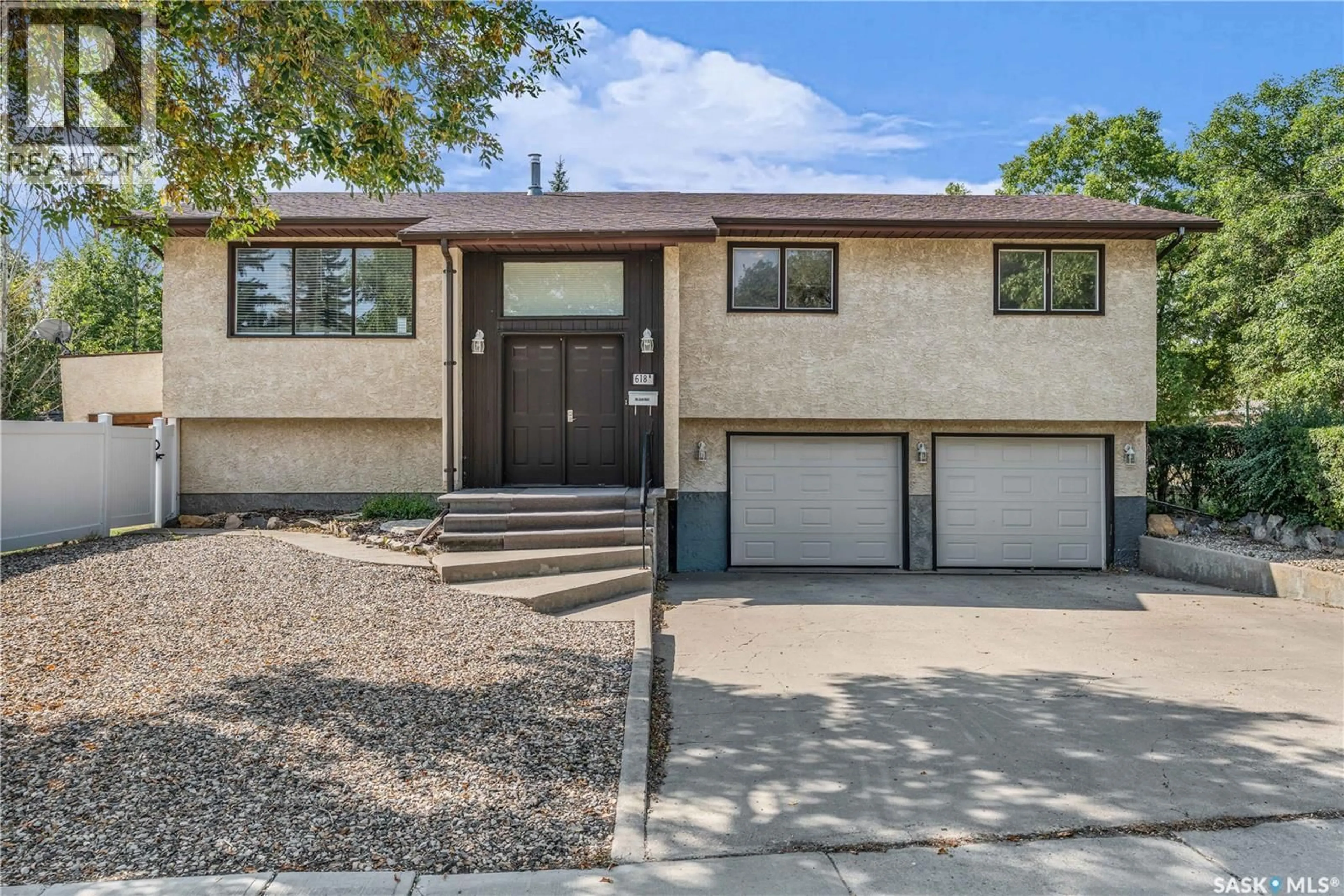 Home with vinyl exterior material, street for 618 MCINTOSH STREET, Regina Saskatchewan S4R5T4