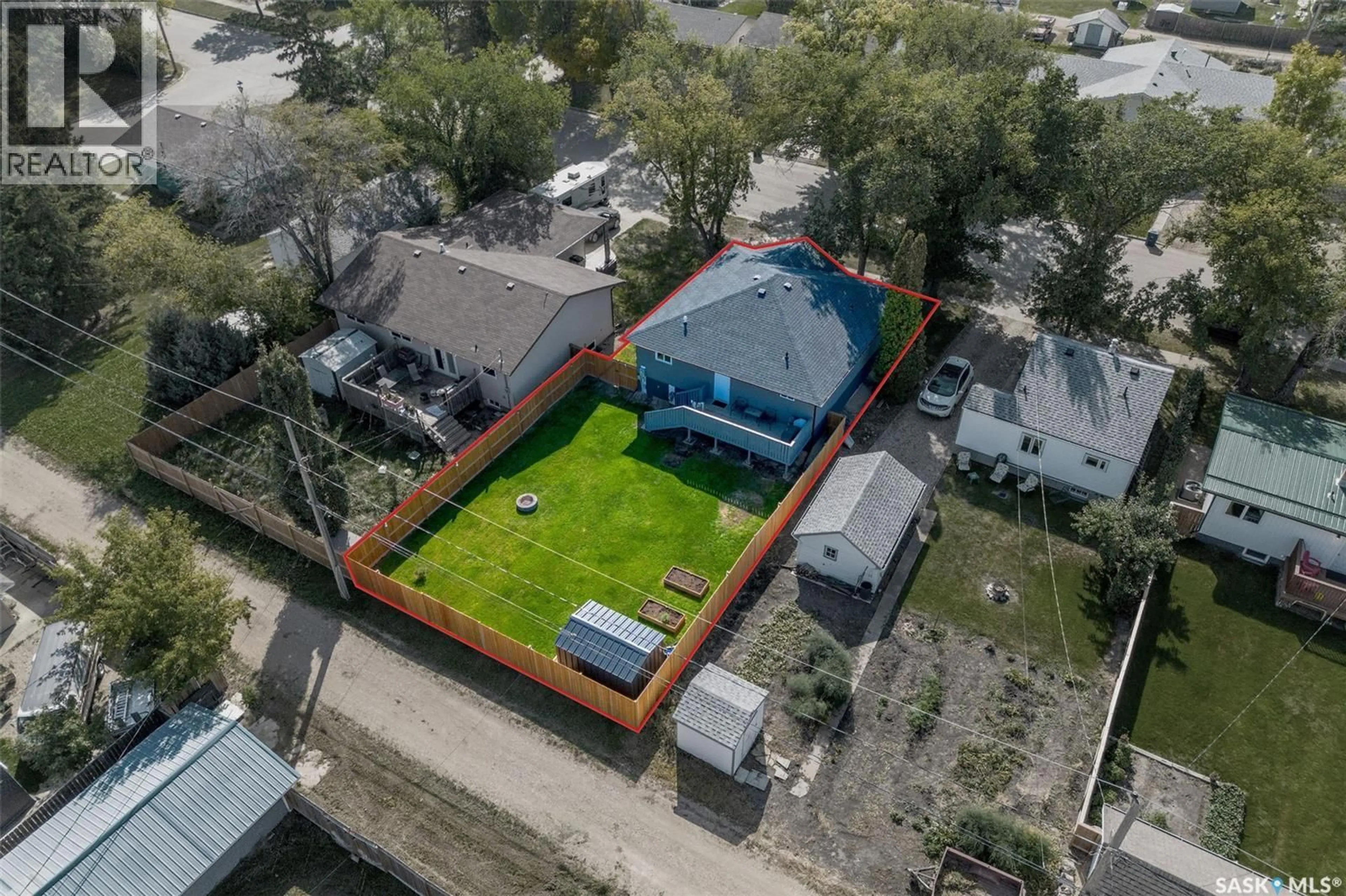A pic from outside/outdoor area/front of a property/back of a property/a pic from drone, street for 813 98TH AVENUE, Tisdale Saskatchewan S0E1T0