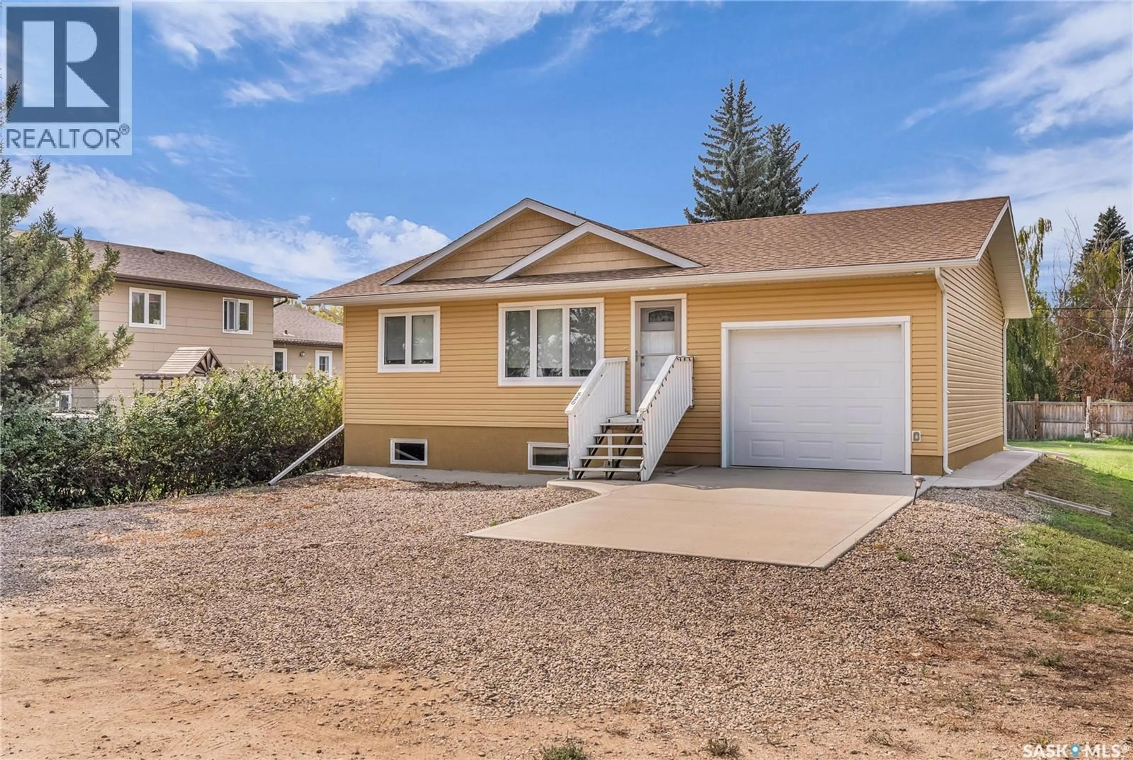 Home with vinyl exterior material, street for 520 LUNN STREET, Asquith Saskatchewan S0K0J0