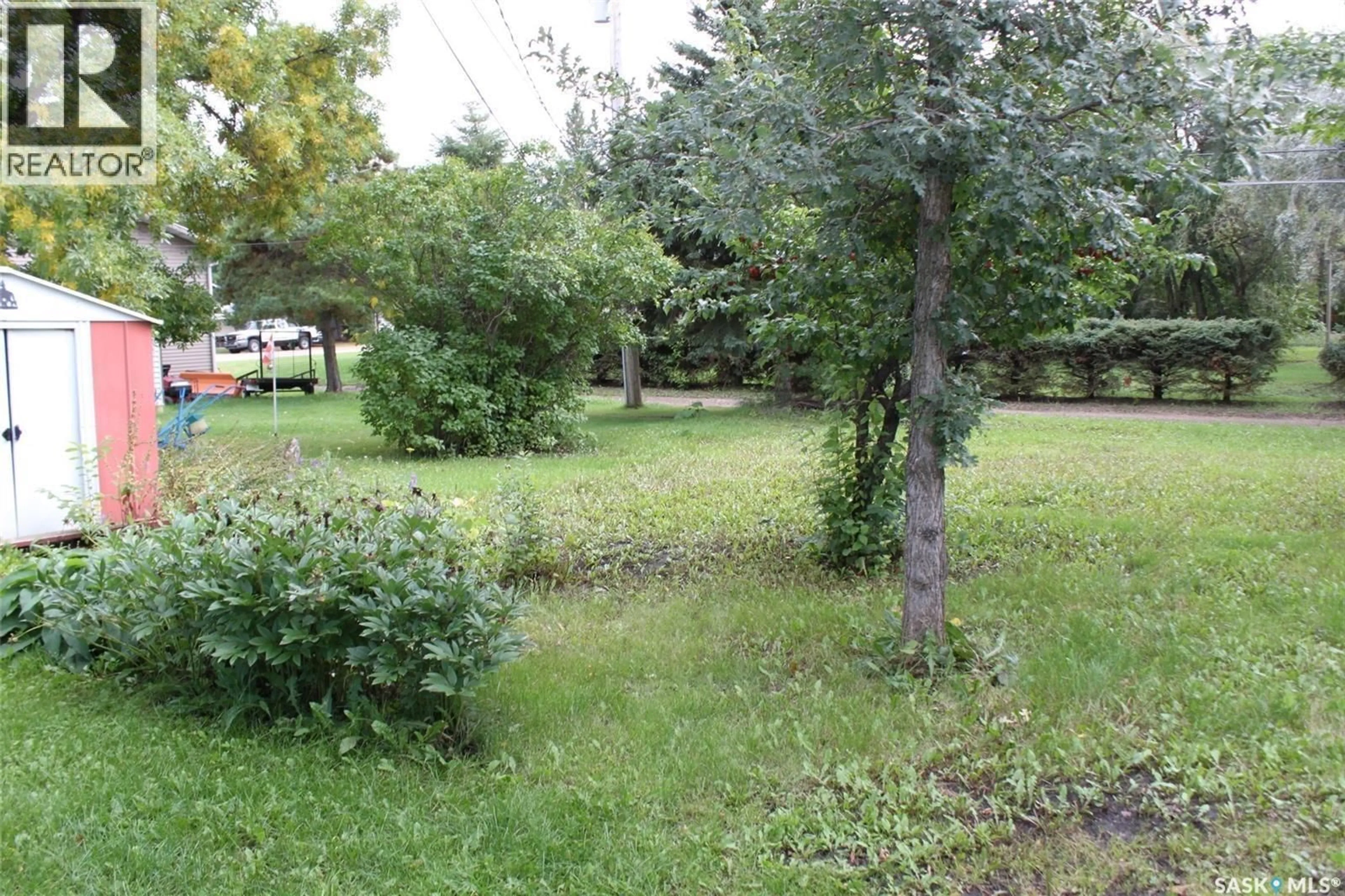 Patio, forest/trees view for 310 1ST AVE, Canora Saskatchewan S0A0L0