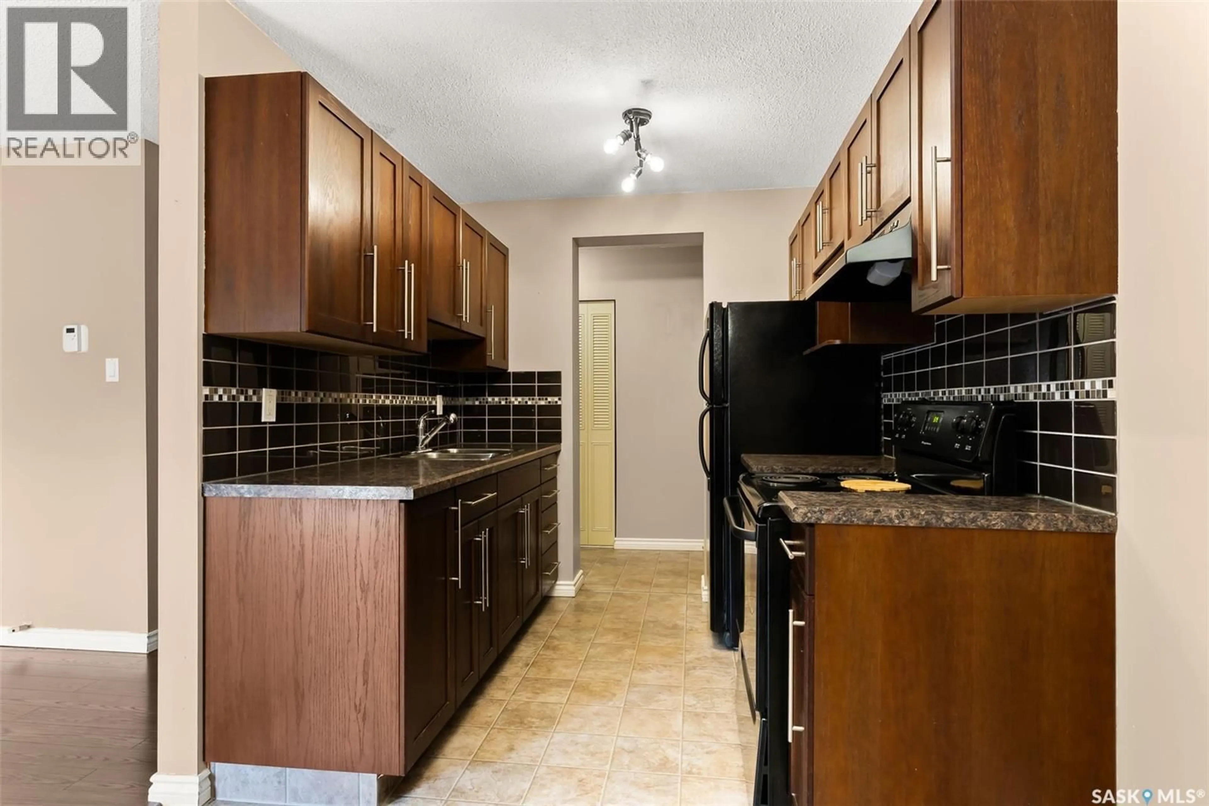 Standard kitchen, ceramic/tile floor for 6 1953 GARNET STREET, Regina Saskatchewan S4T2Z5