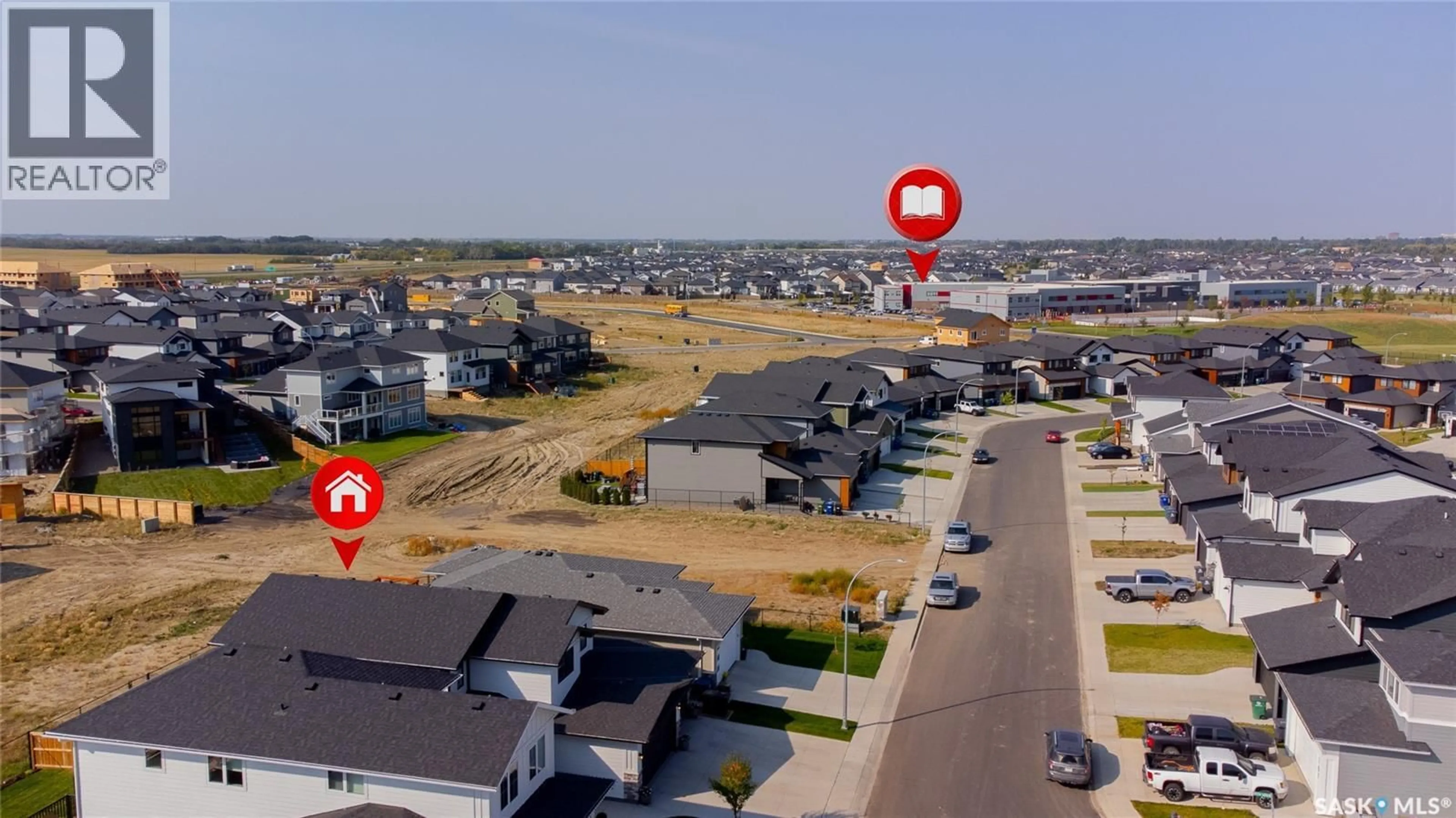A pic from outside/outdoor area/front of a property/back of a property/a pic from drone, street for 170 KEITH WAY, Saskatoon Saskatchewan S7V0X9