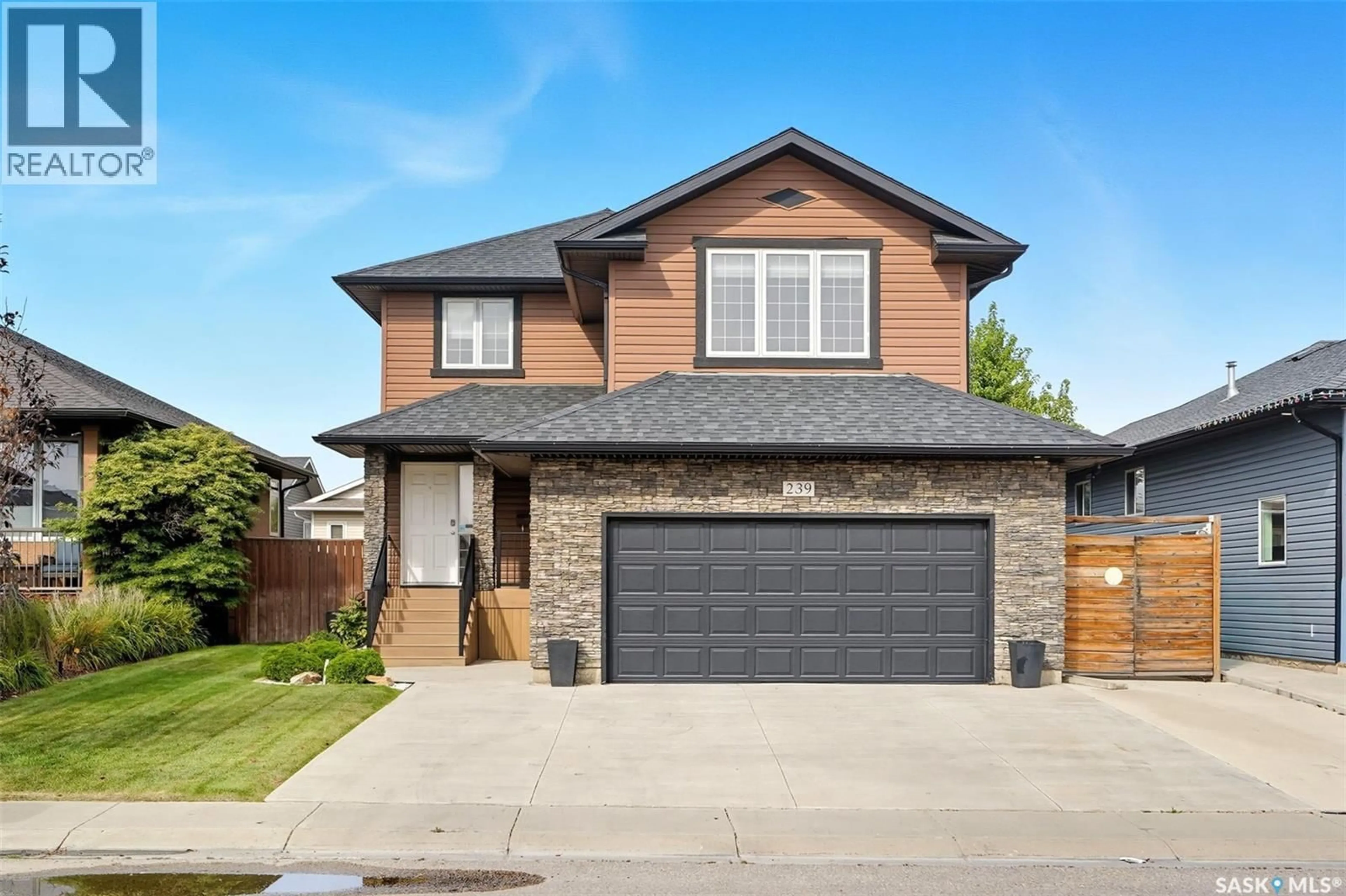 Home with brick exterior material, street for 239 GREENFIELD CRESCENT, Saskatoon Saskatchewan S7R0B6