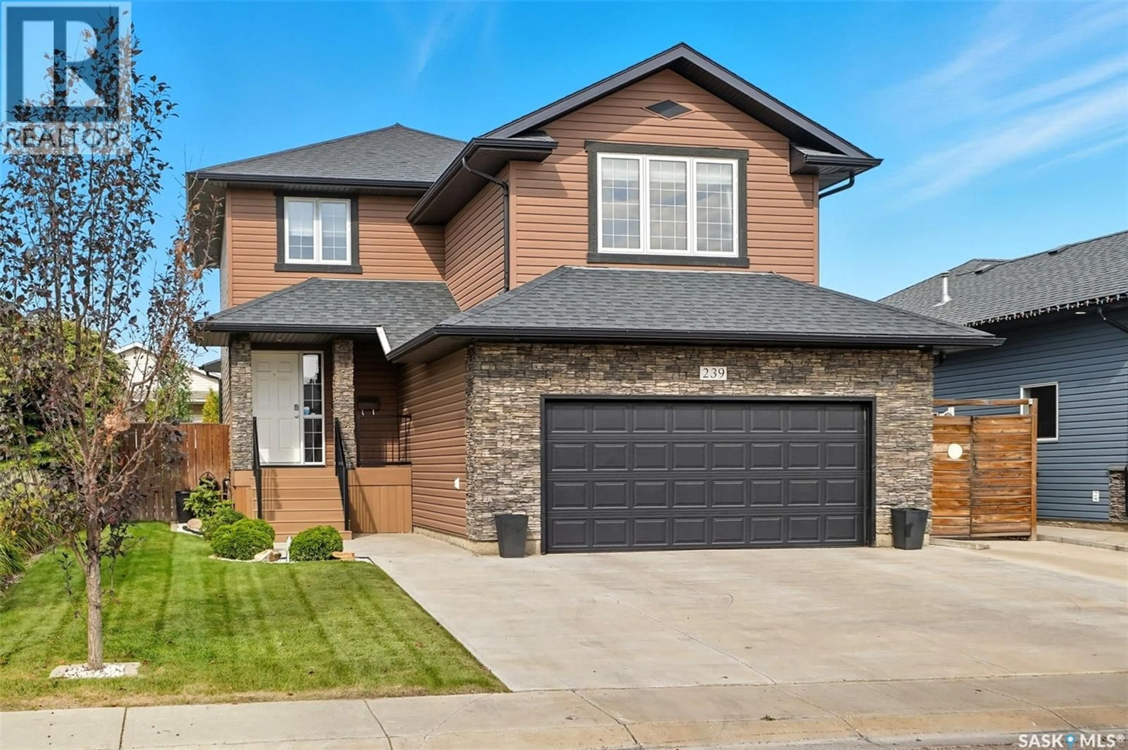 Home with brick exterior material, street for 239 GREENFIELD CRESCENT, Saskatoon Saskatchewan S7R0B6