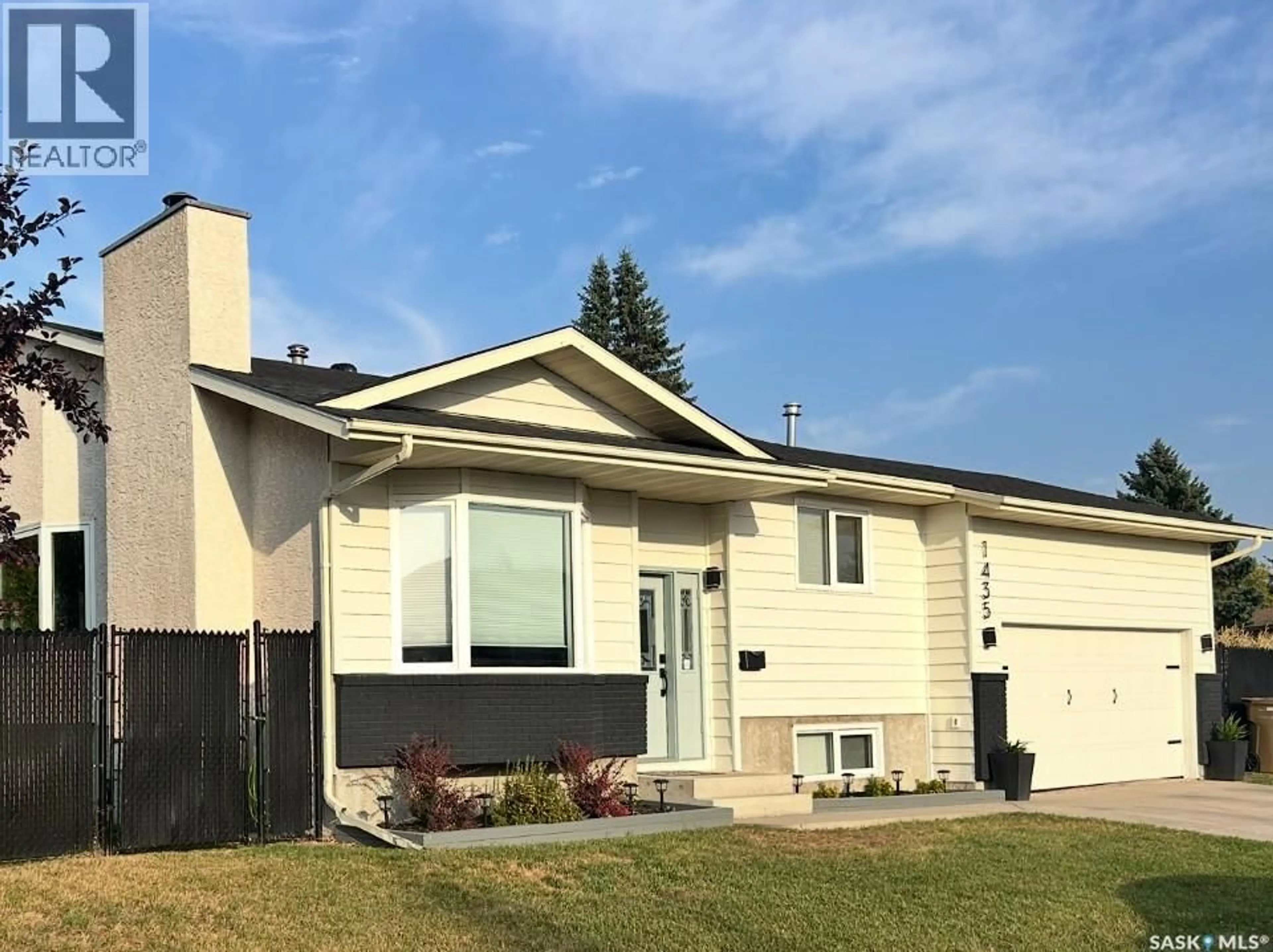 Home with vinyl exterior material, street for 1435 RADWAY STREET, Regina Saskatchewan S4X4A8