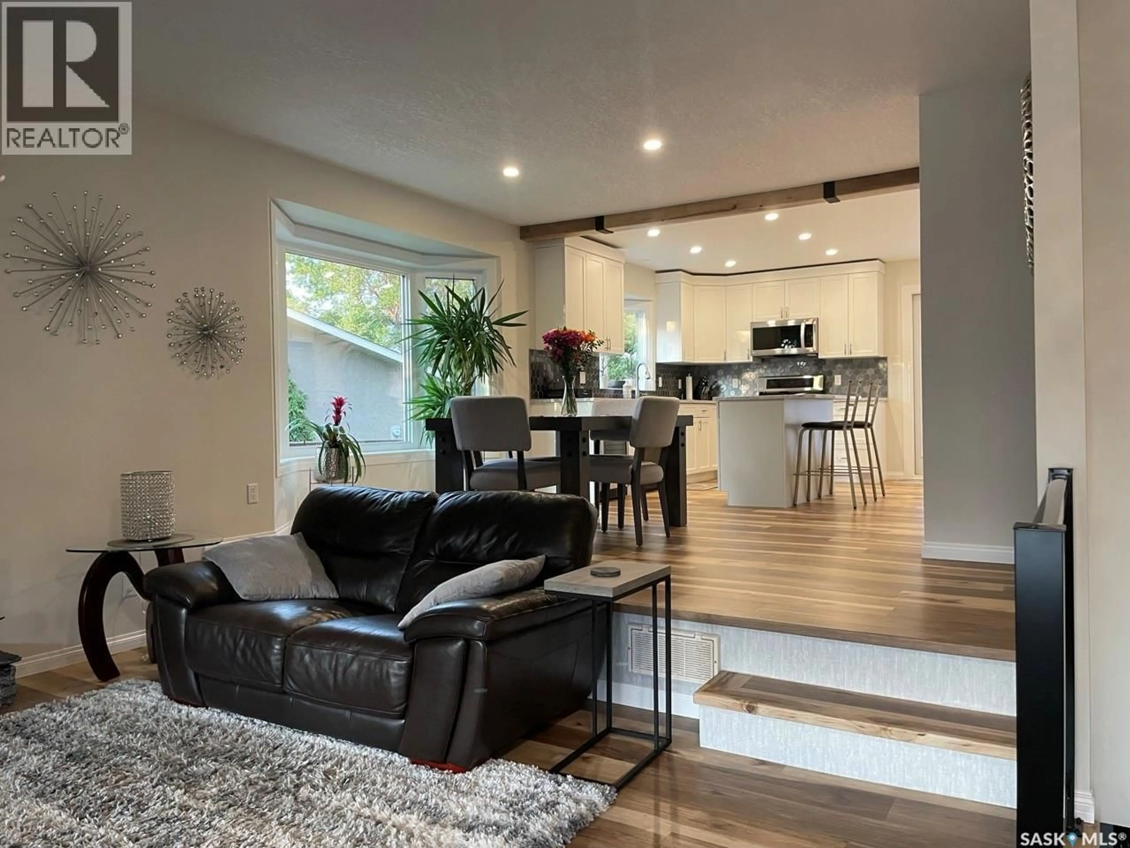Living room with furniture, wood/laminate floor for 1435 RADWAY STREET, Regina Saskatchewan S4X4A8