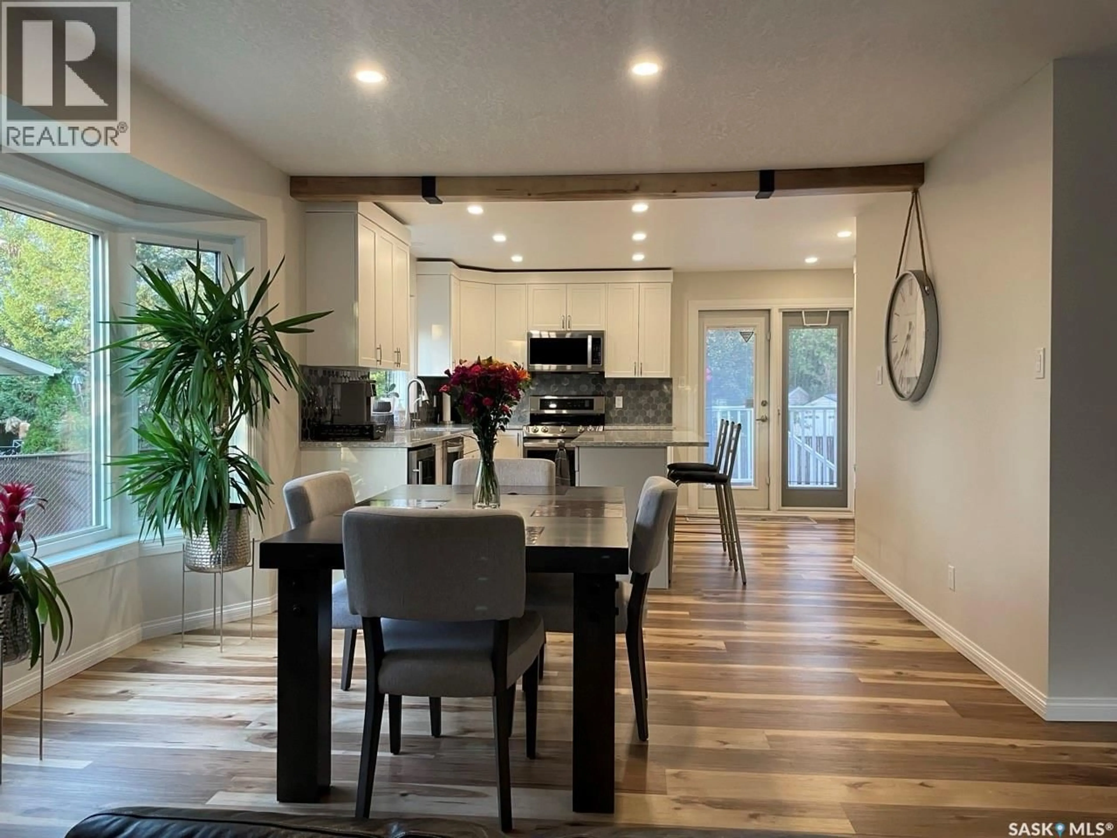 Open concept kitchen, wood/laminate floor for 1435 RADWAY STREET, Regina Saskatchewan S4X4A8