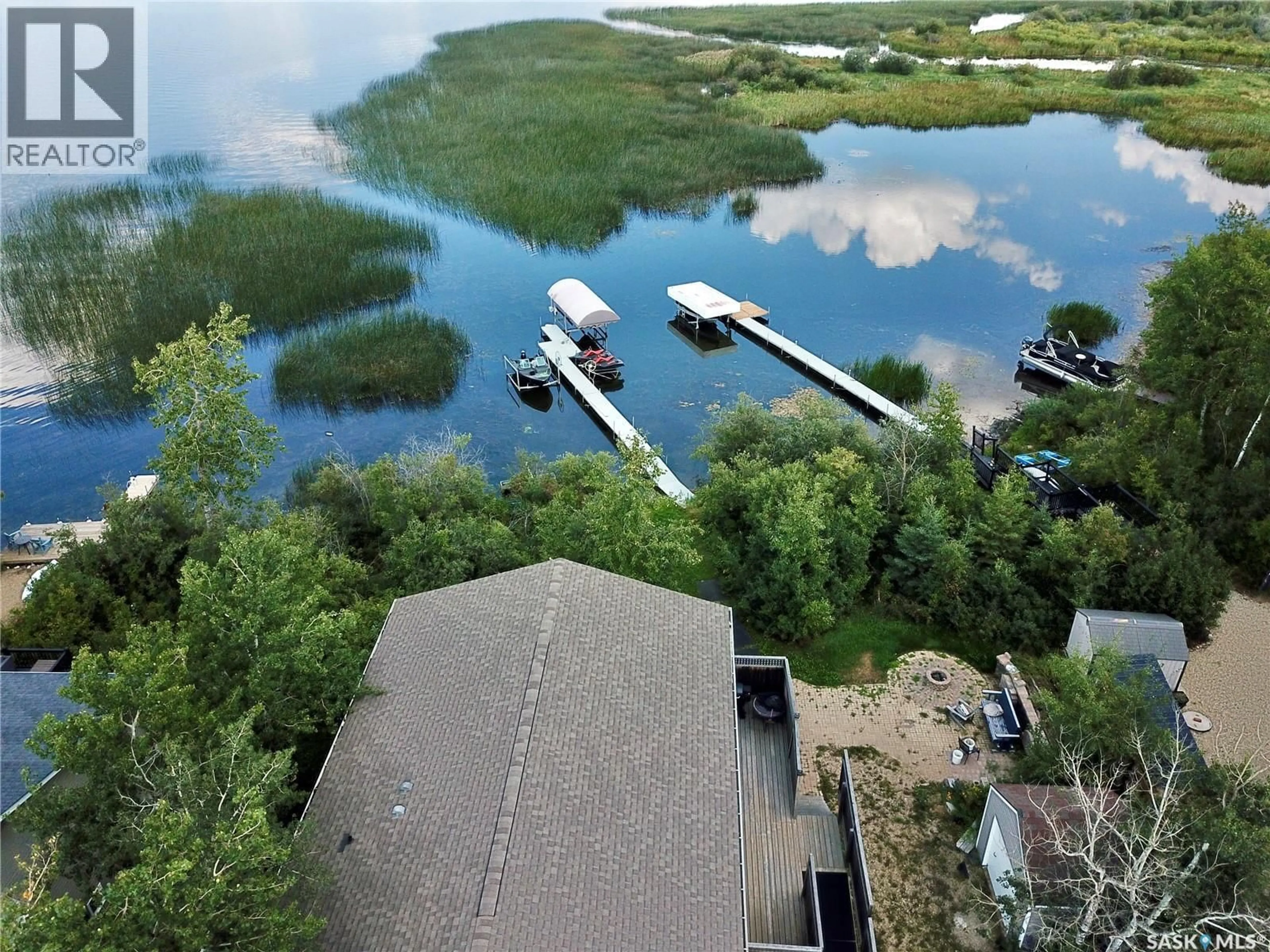 A pic from outside/outdoor area/front of a property/back of a property/a pic from drone, water/lake/river/ocean view for 319 RAVINE ROAD, Big Shell Saskatchewan S0J2G0