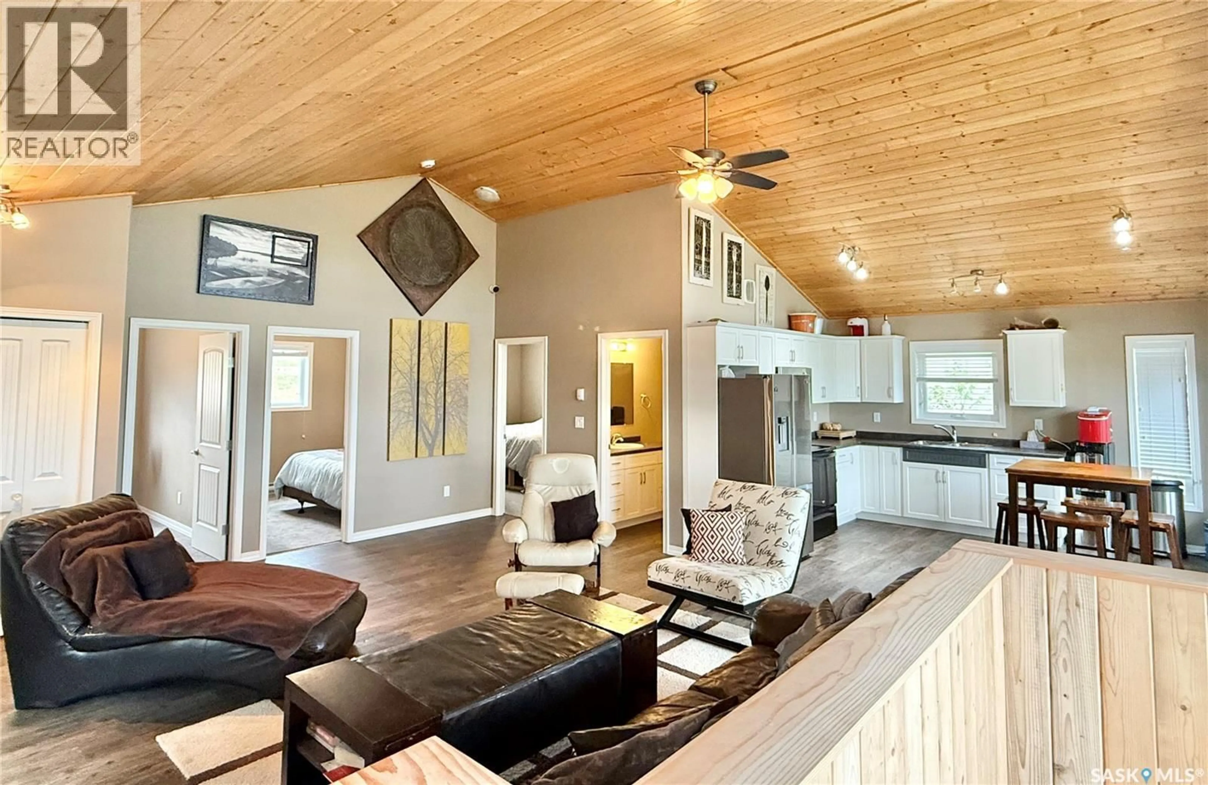 Open concept kitchen, wood/laminate floor for 319 RAVINE ROAD, Big Shell Saskatchewan S0J2G0