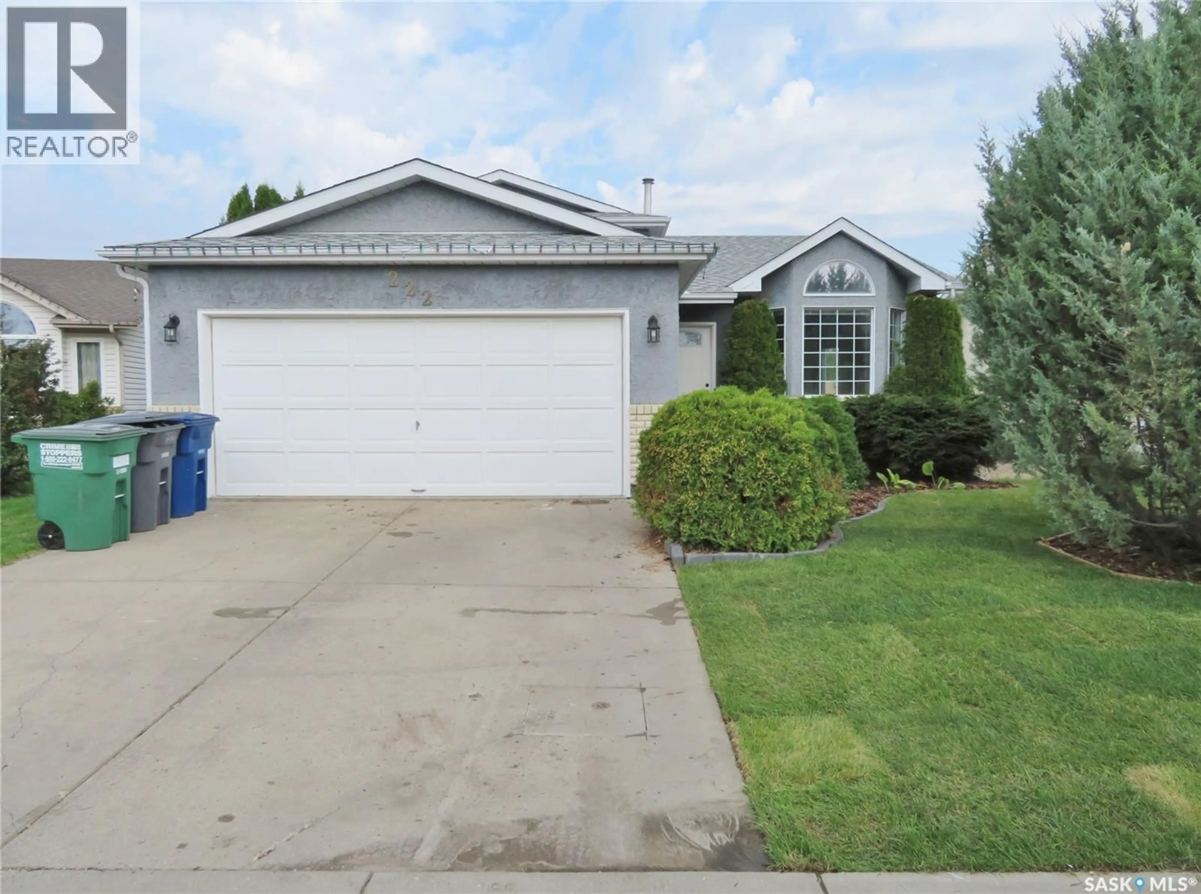 Home with vinyl exterior material, street for 222 KELLER CRESCENT, Saskatoon Saskatchewan S7J5G3
