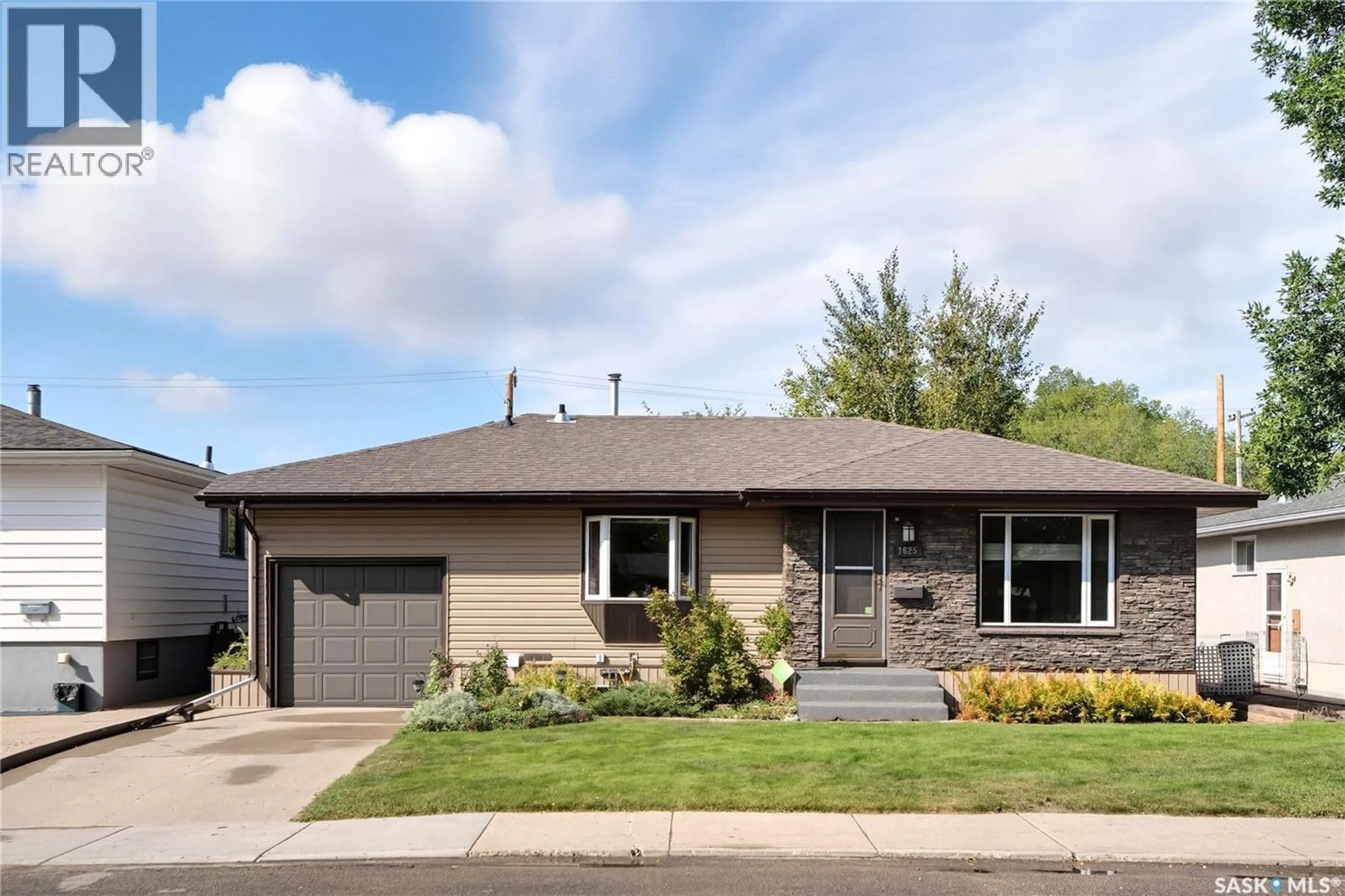 Home with brick exterior material, street for 1625 PRINCE OF WALES AVENUE, Saskatoon Saskatchewan S7K3E3