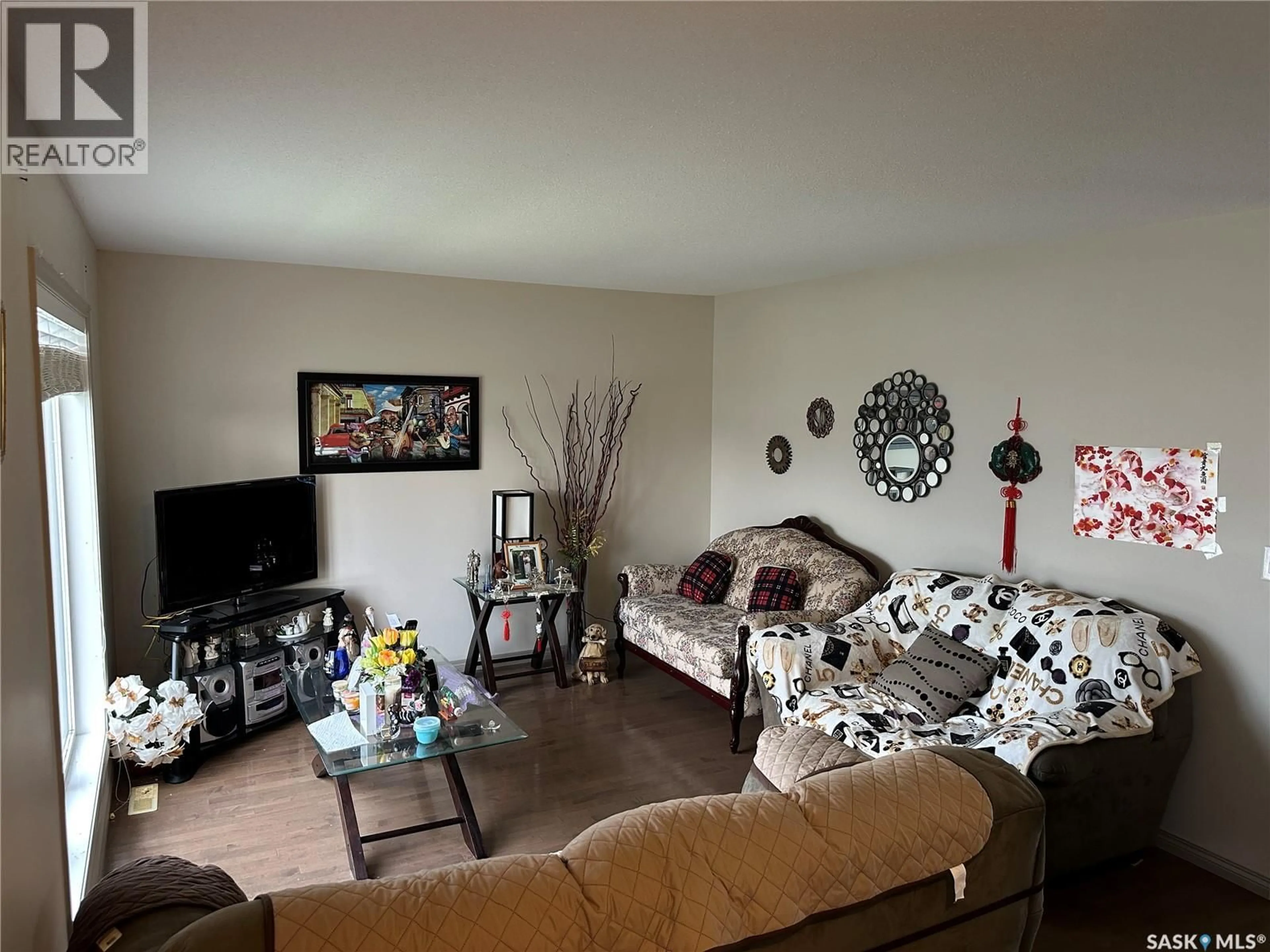 Living room with furniture, unknown for 902 GLENVIEW COVE, Martensville Saskatchewan S0K0A2