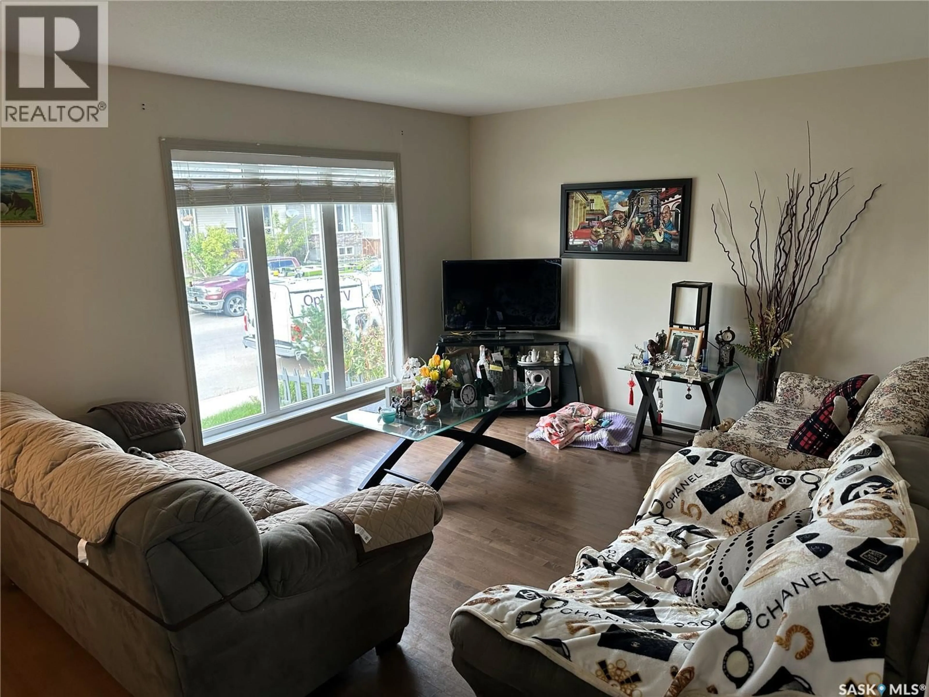 Living room with furniture, unknown for 902 GLENVIEW COVE, Martensville Saskatchewan S0K0A2